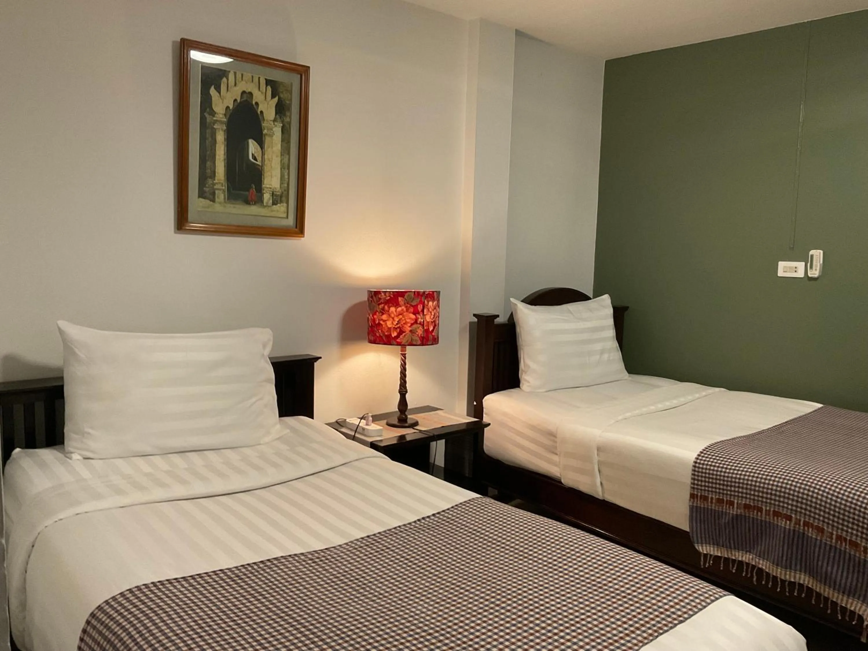 Bed in Baan Klang Vieng