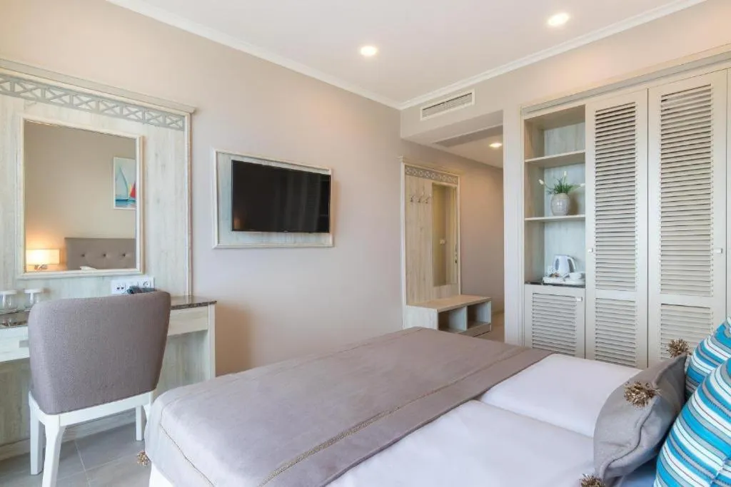 Bed in King Maron Beach Hotel & Spa