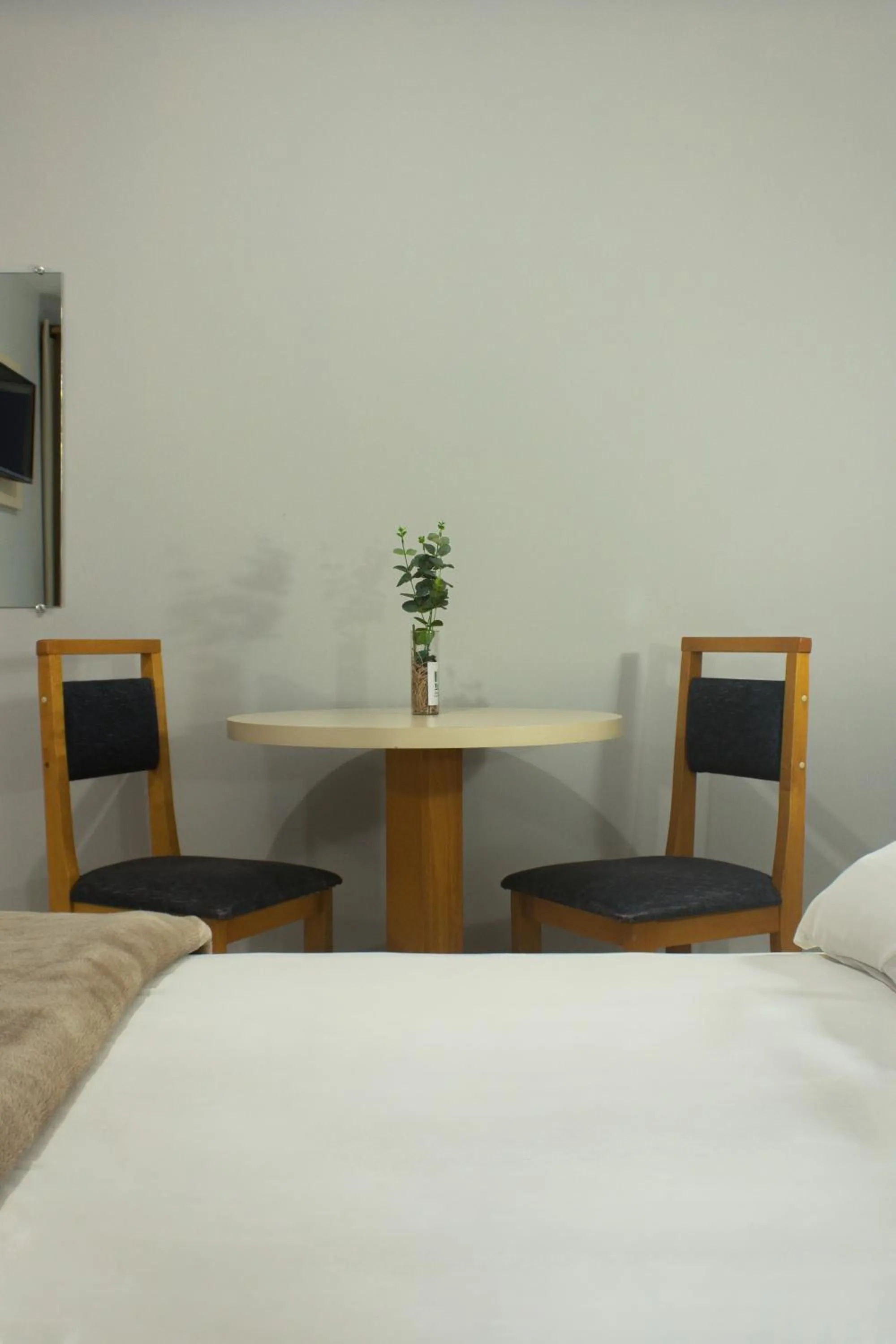 Bed in Hotel Caverá