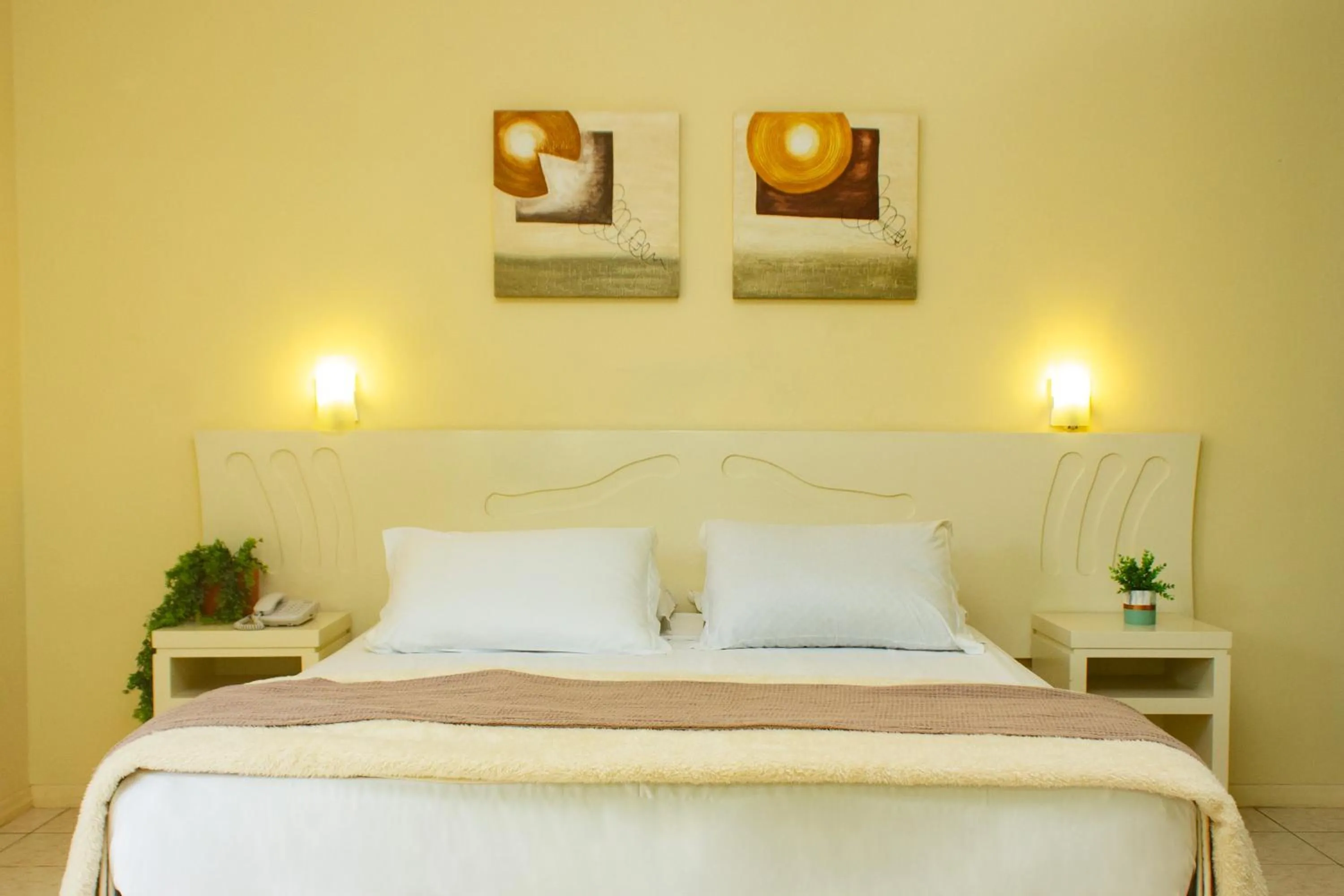 Bed in Hotel Caverá