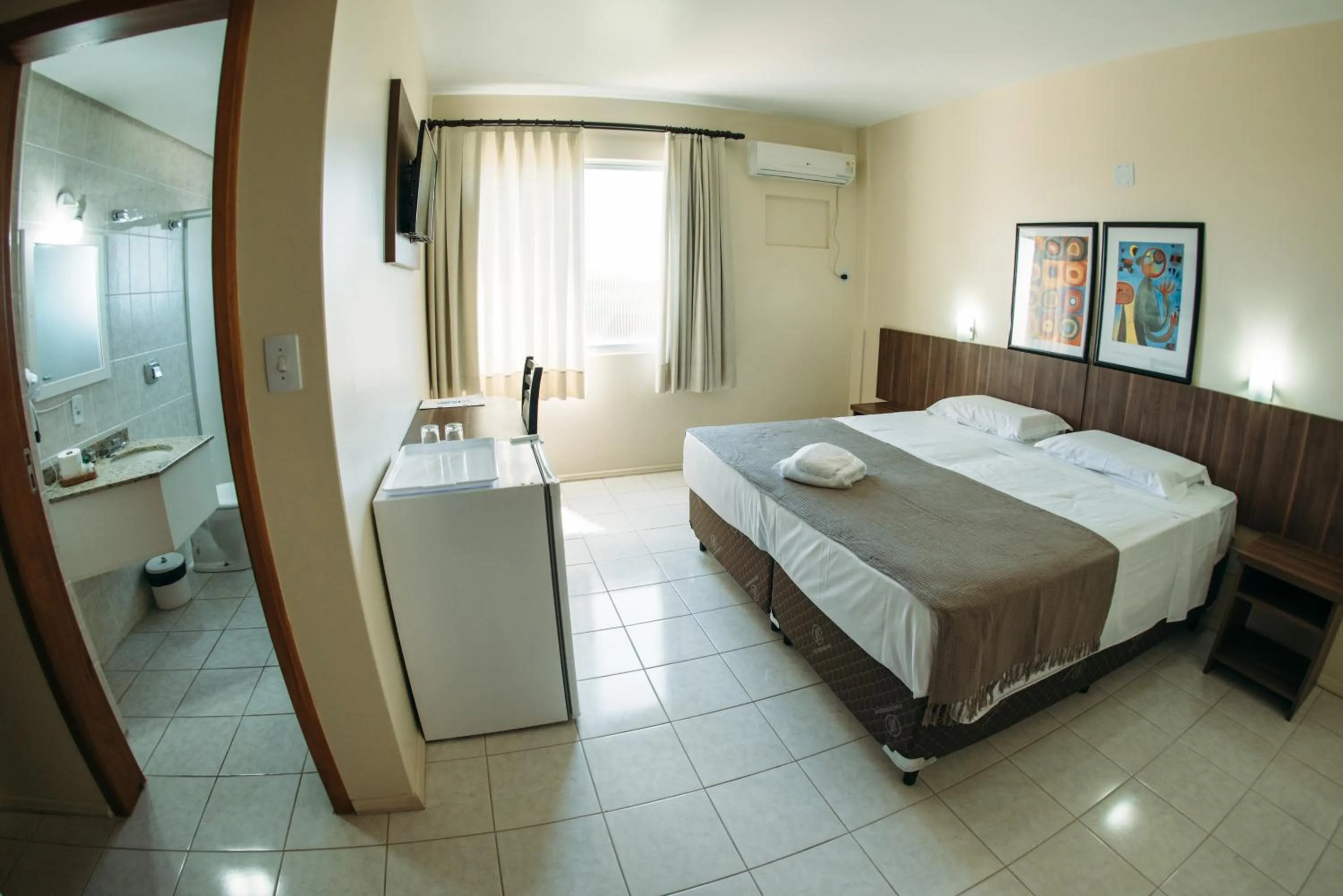 Bed in Hotel Caverá