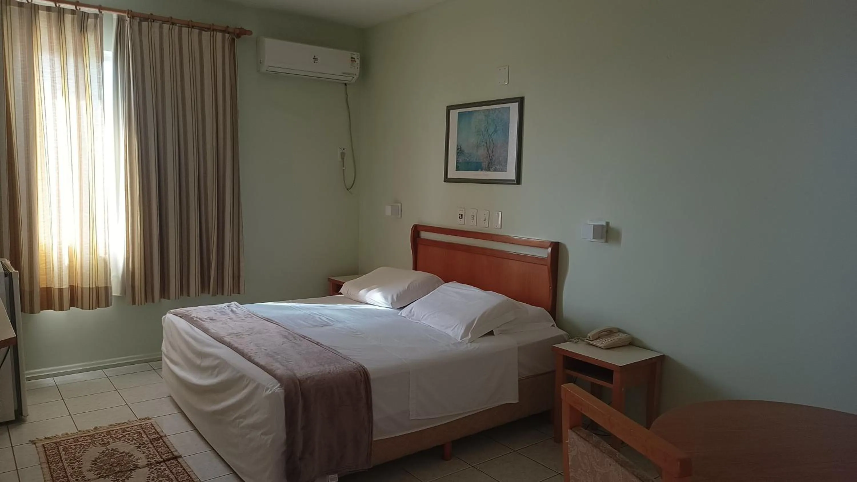 Bed in Hotel Caverá