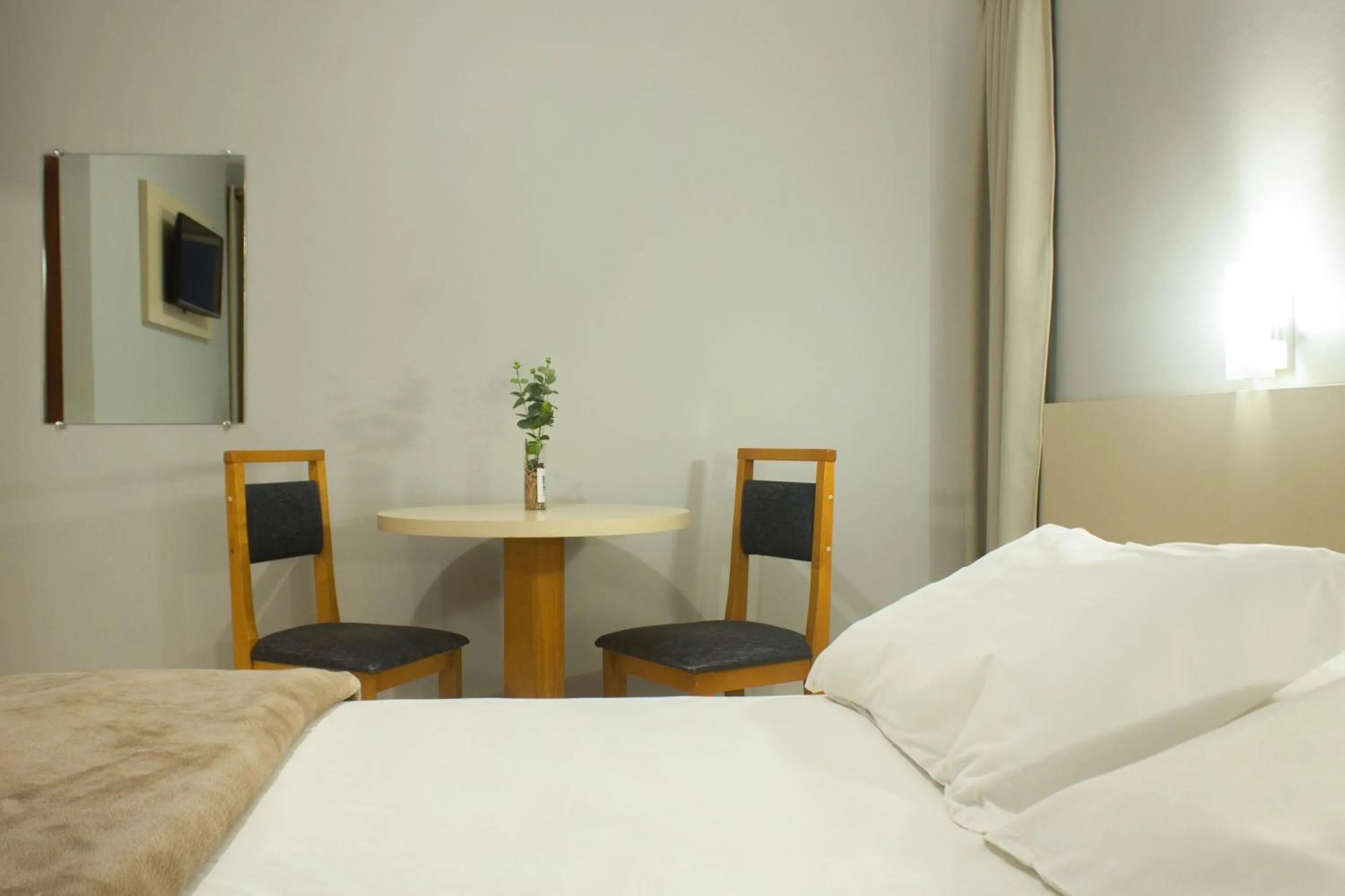 Bed in Hotel Caverá