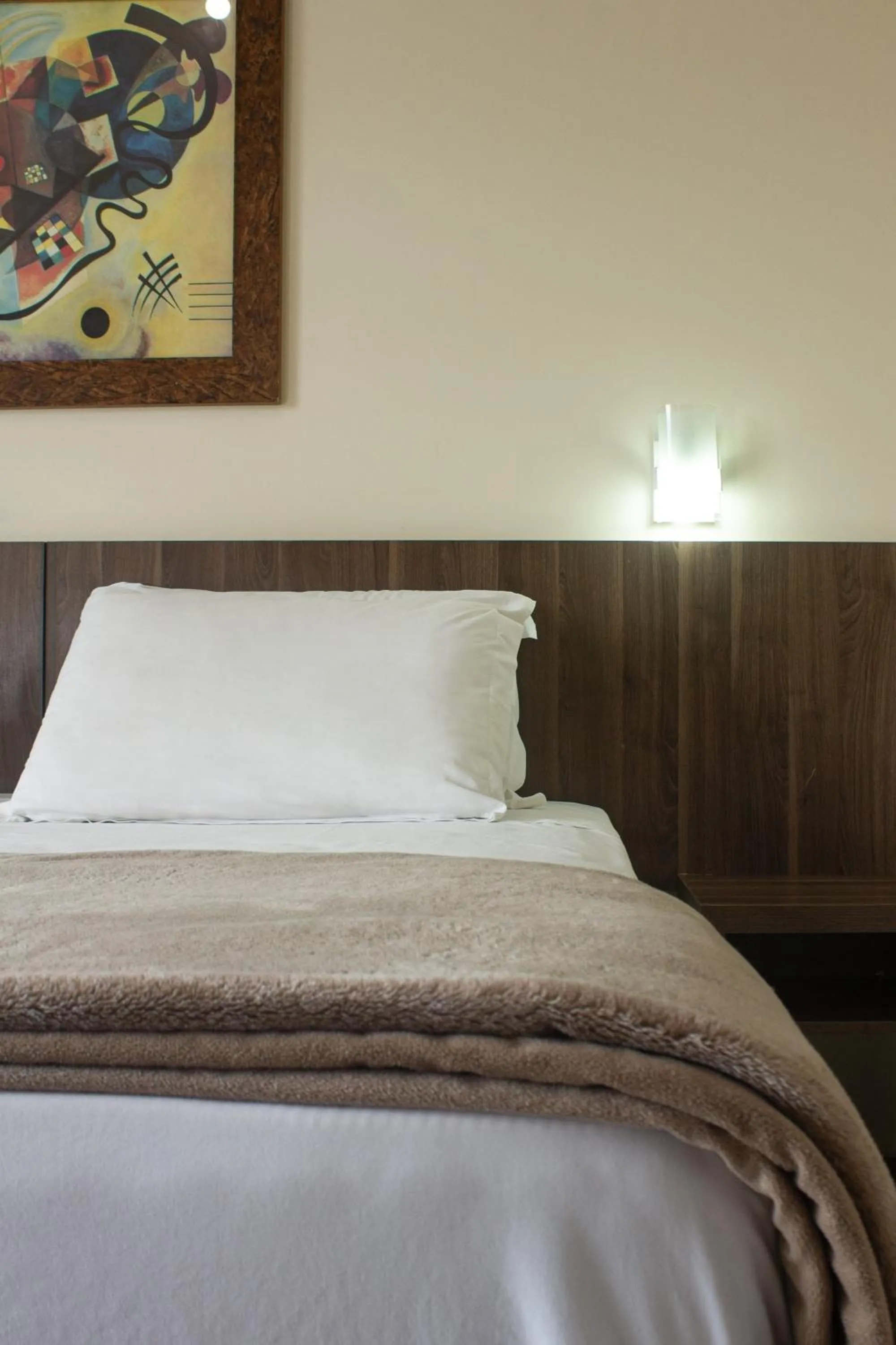 Bed in Hotel Caverá