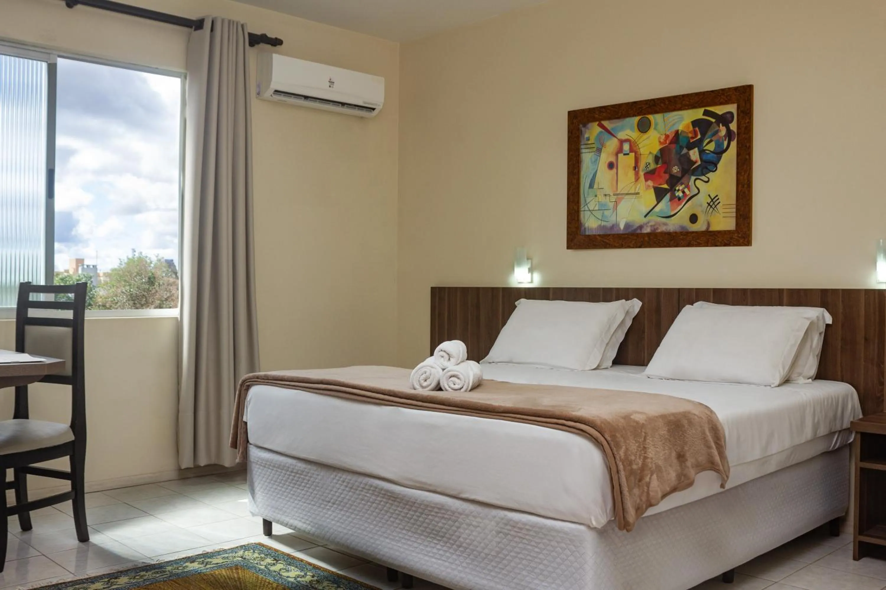 Bed in Hotel Caverá