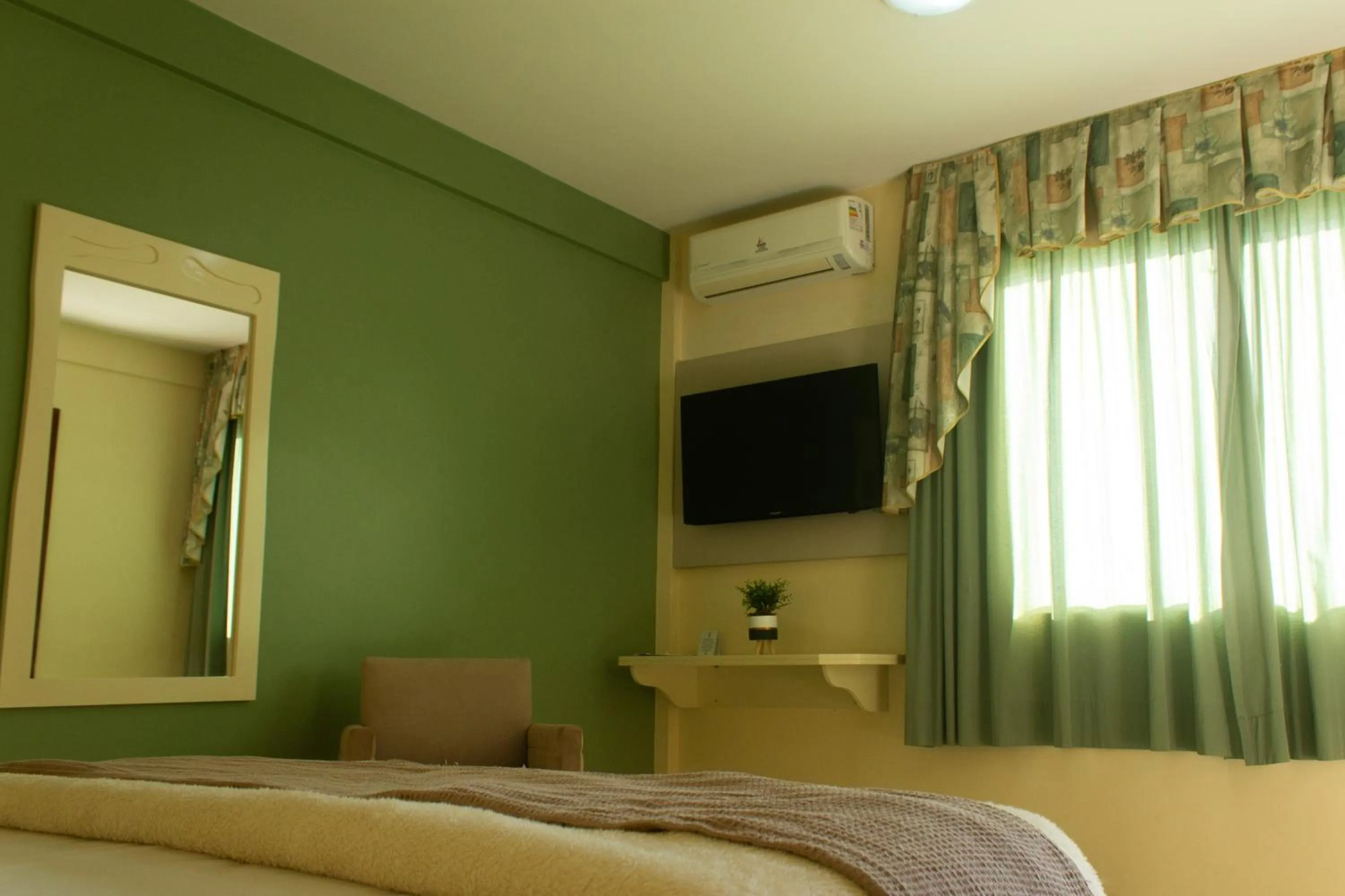Bed in Hotel Caverá