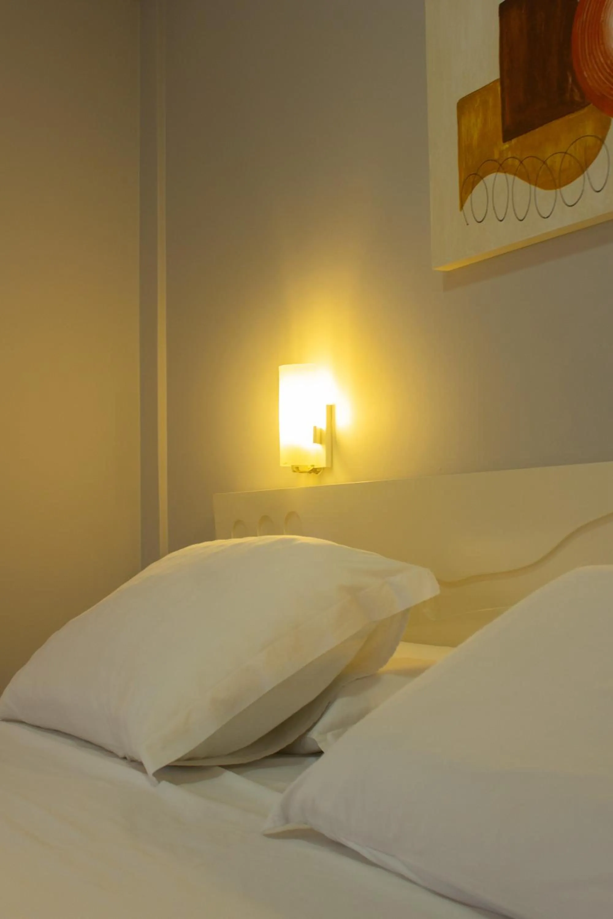 Bed in Hotel Caverá