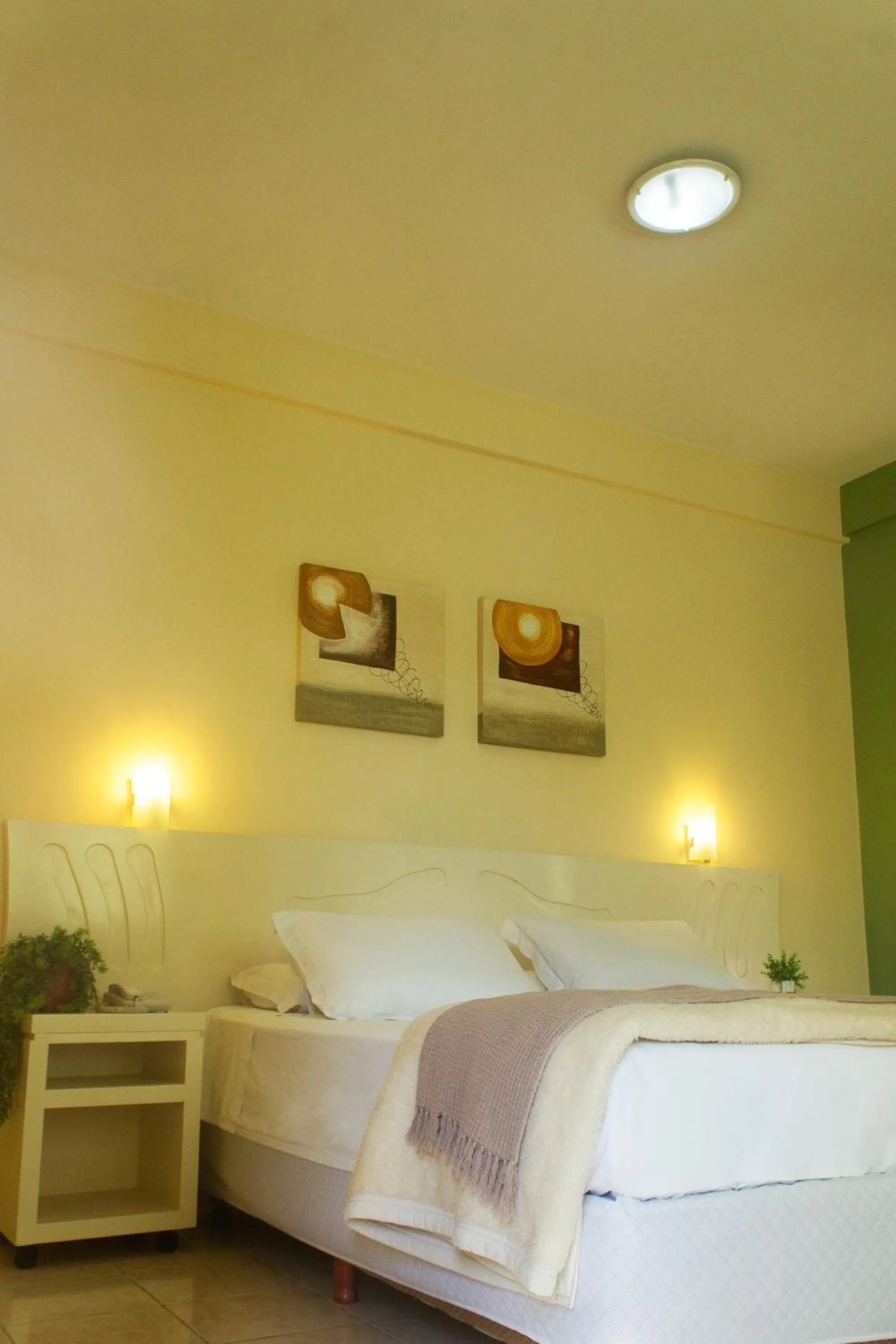 Bed in Hotel Caverá