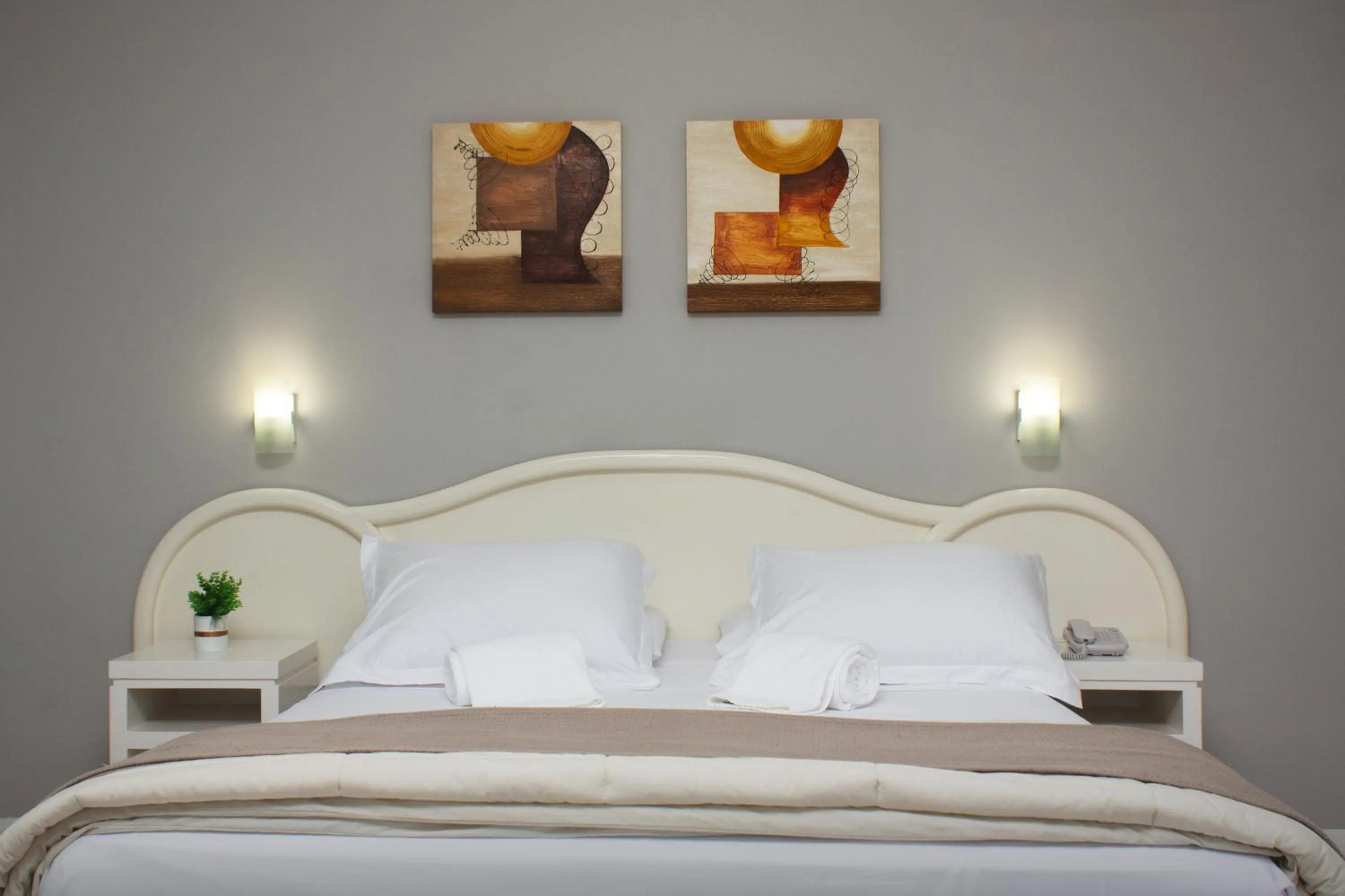 Bed in Hotel Caverá
