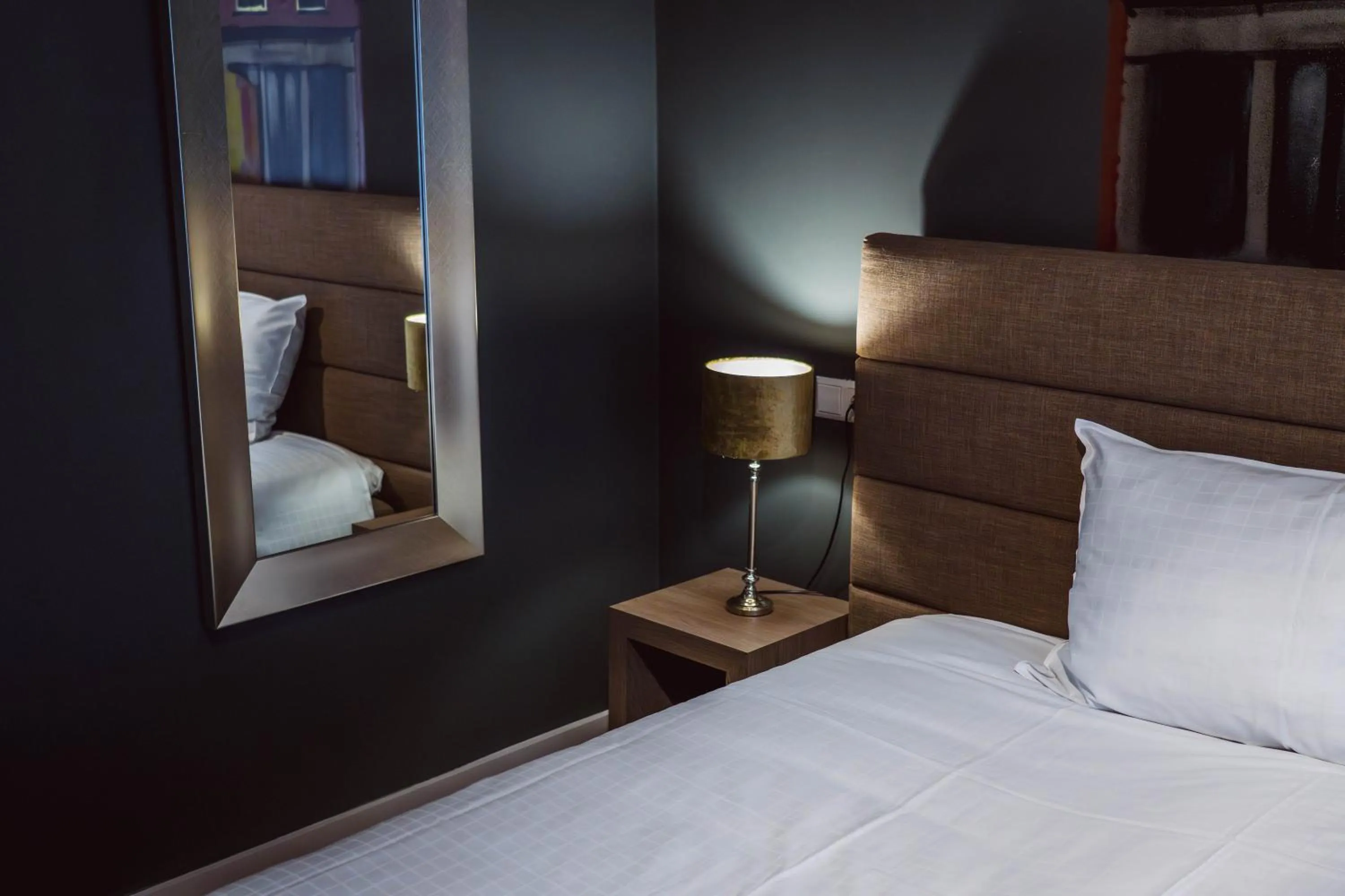 Bed in Tres Boutique Hotel