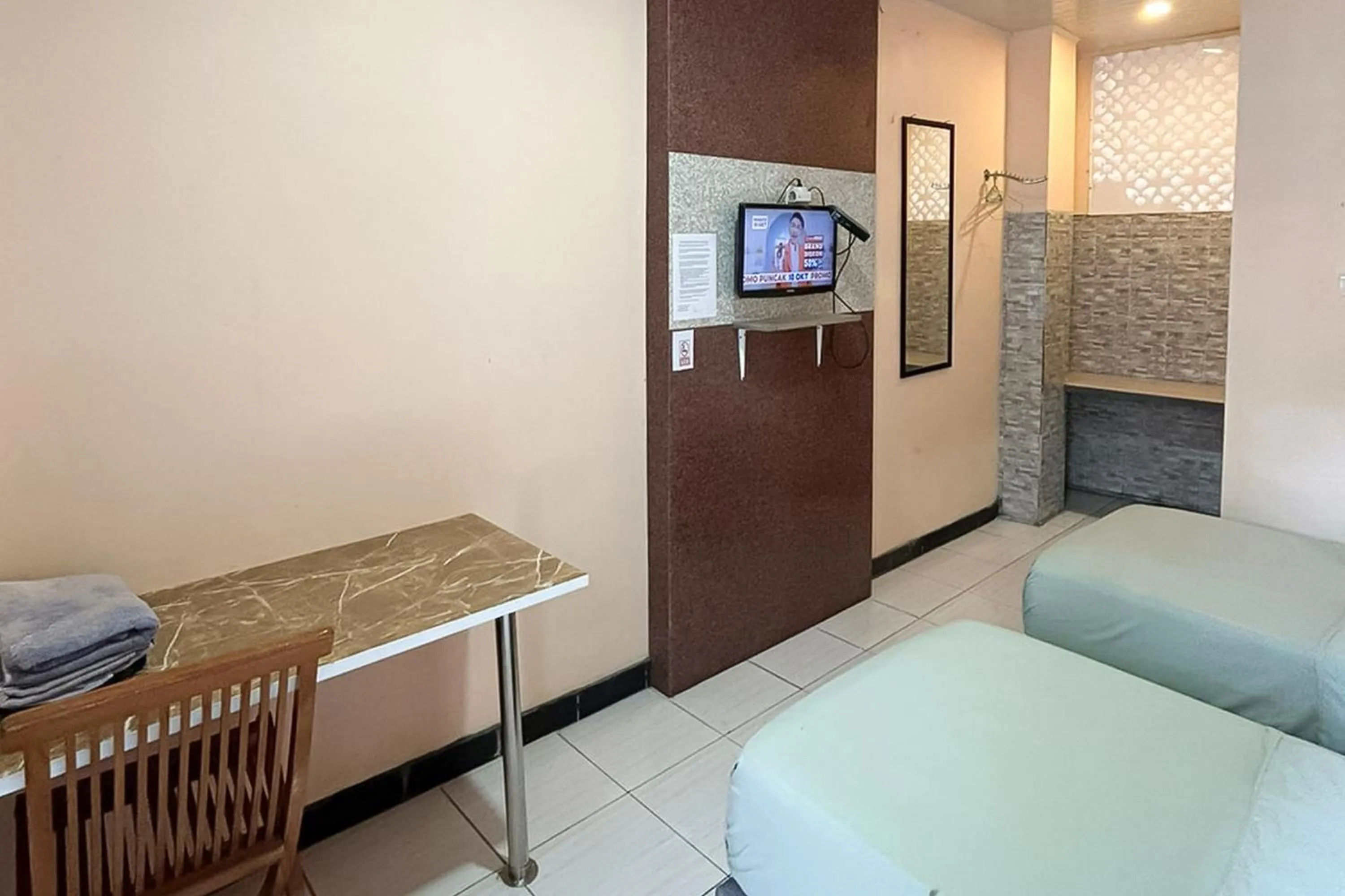 Bedroom, Bed in Urbanview Hotel Delima 101 Syariah