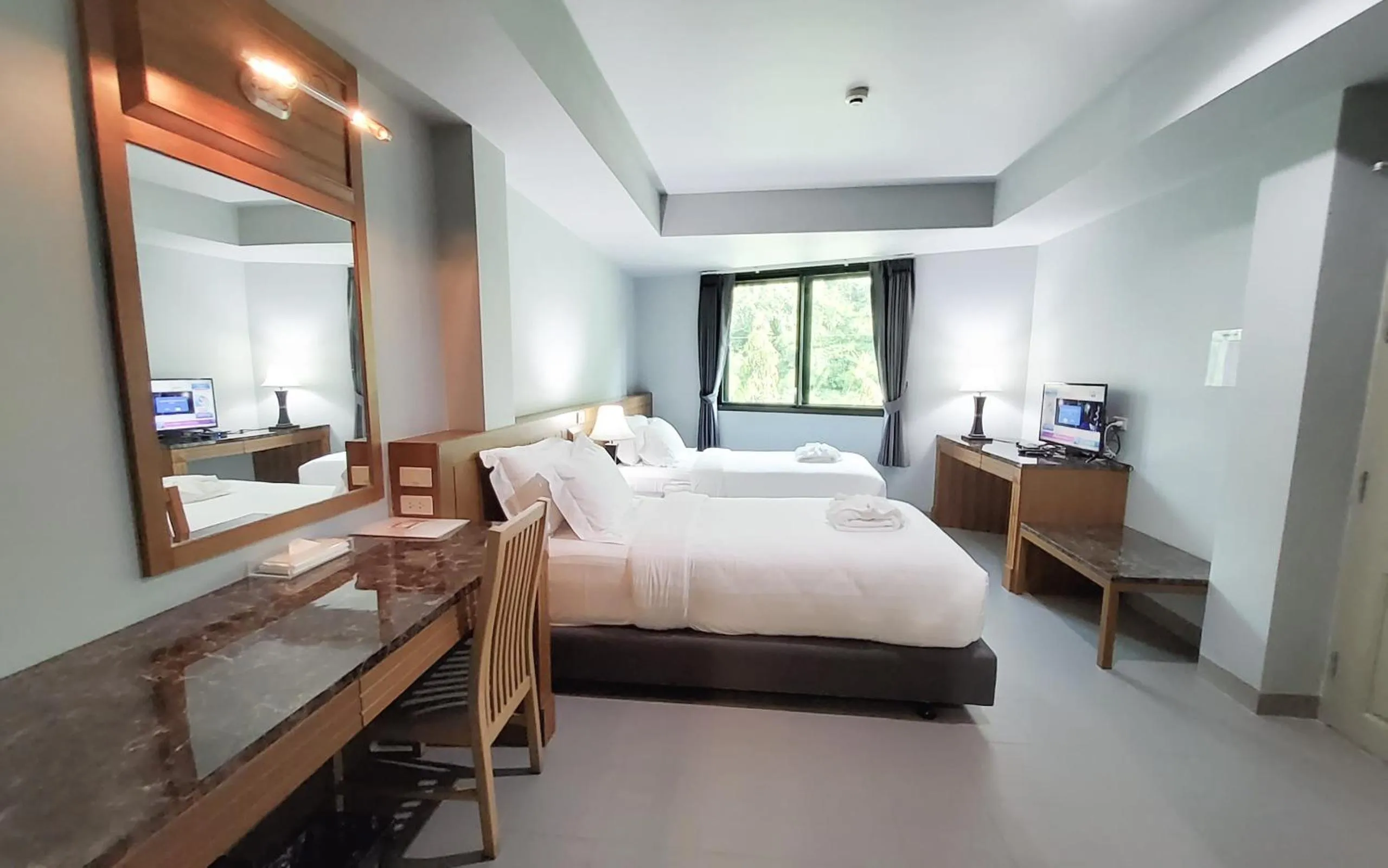 Bed in Plakan Resort