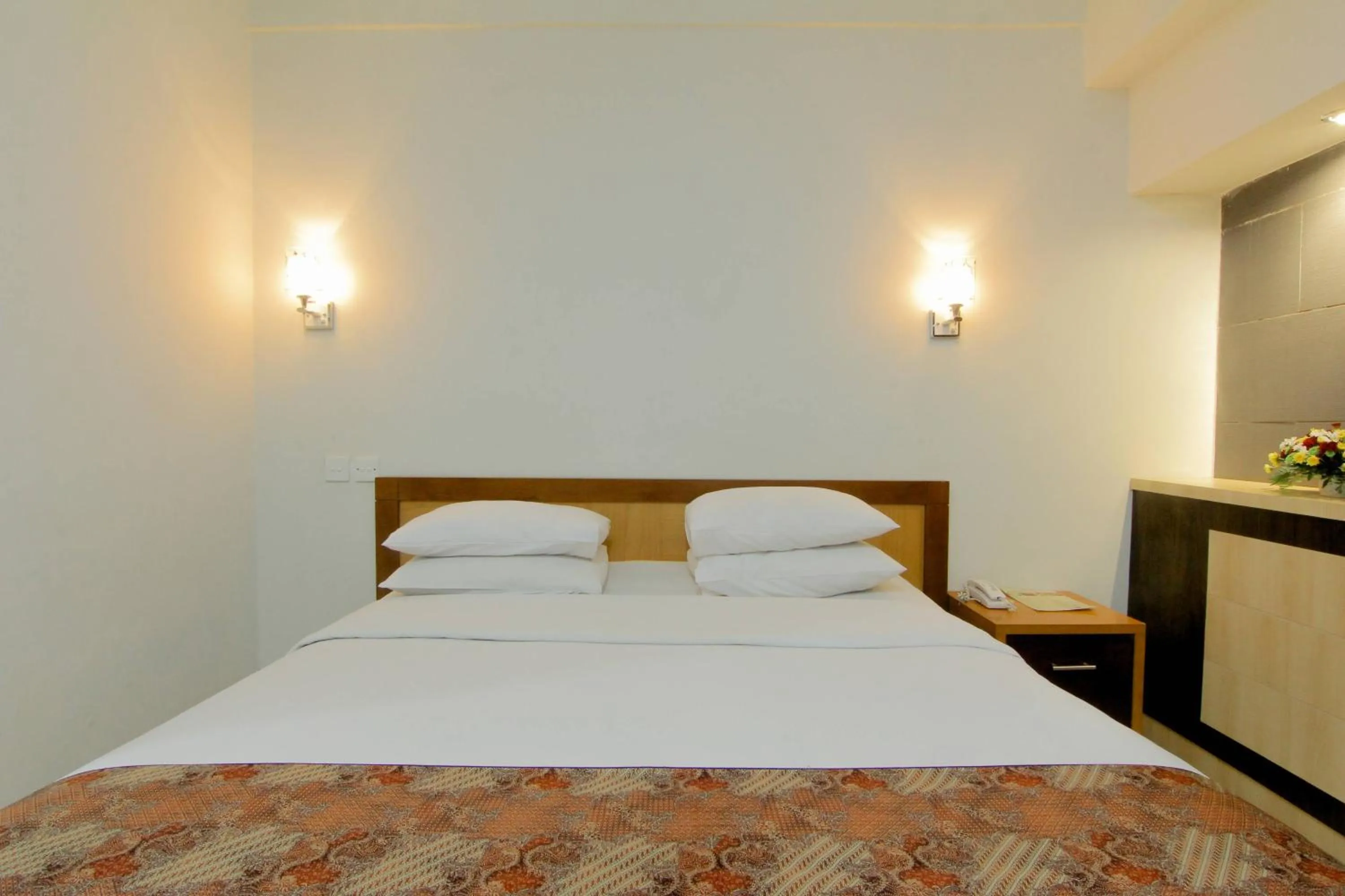 Bed in University Hotel Yogyakarta