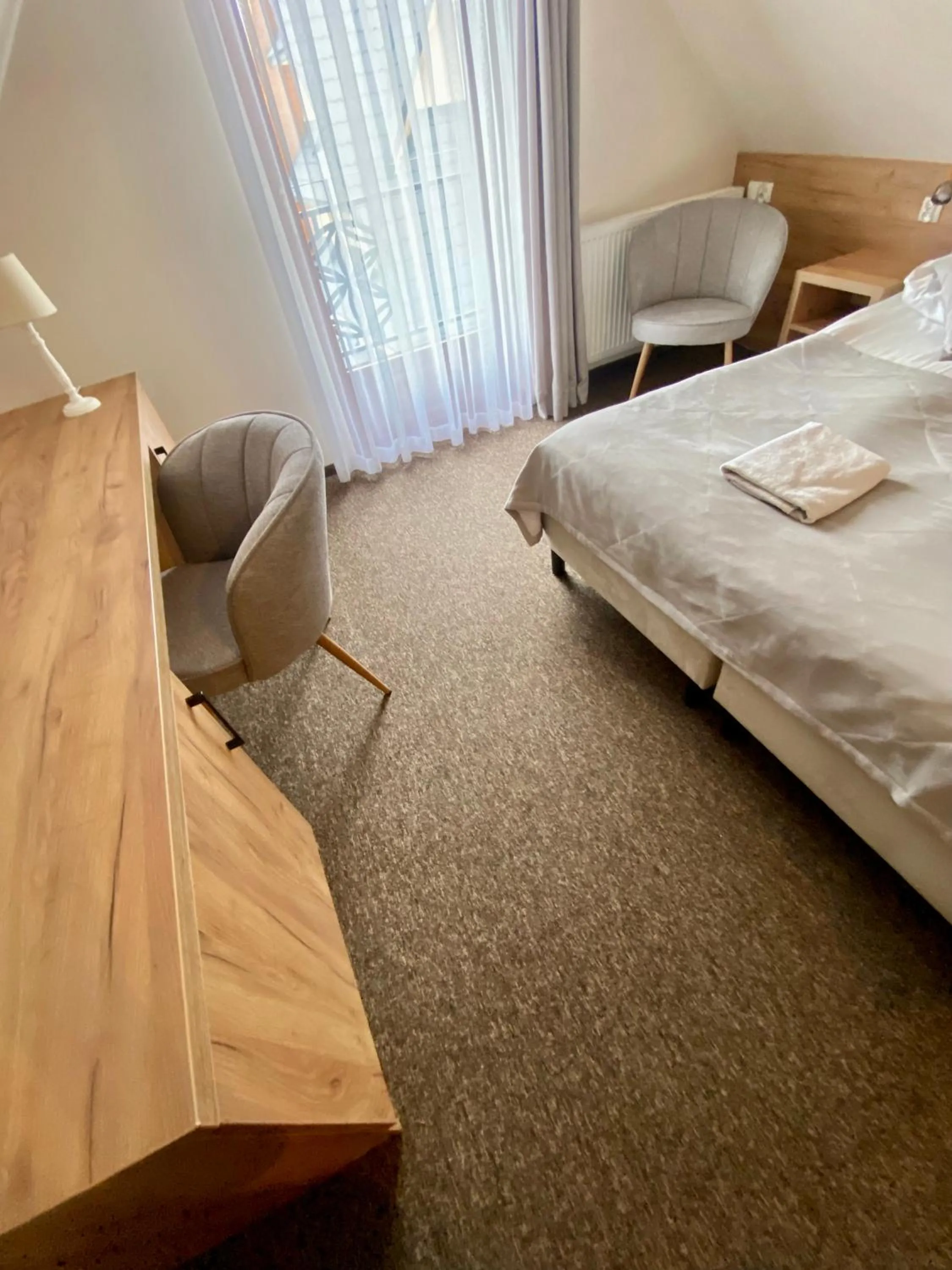 Bed in ZAJAZD BIAŁCZAŃSKI Dom Wypoczynkowy Restauracja