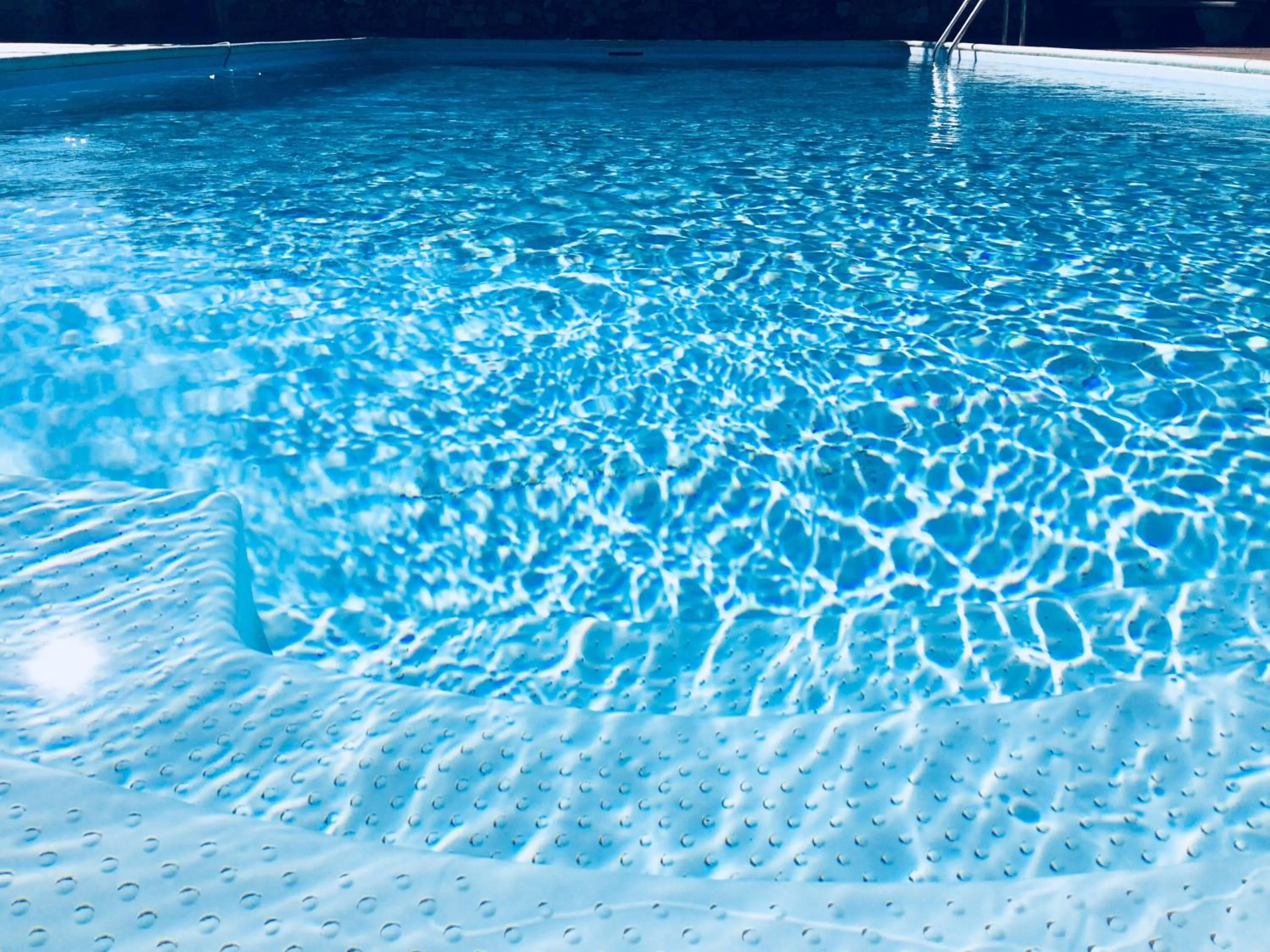 Swimming pool in Albergo Hotel Villaggio Ristorante Tanit