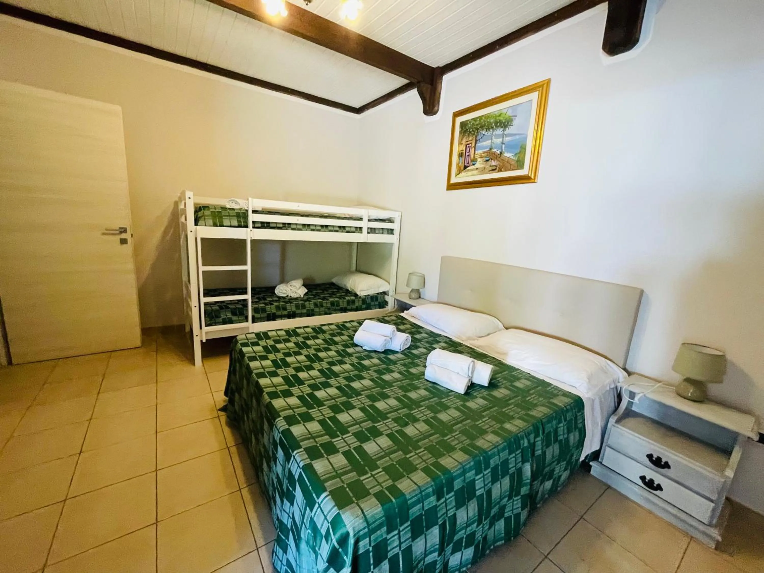 Bed in Albergo Hotel Villaggio Ristorante Tanit