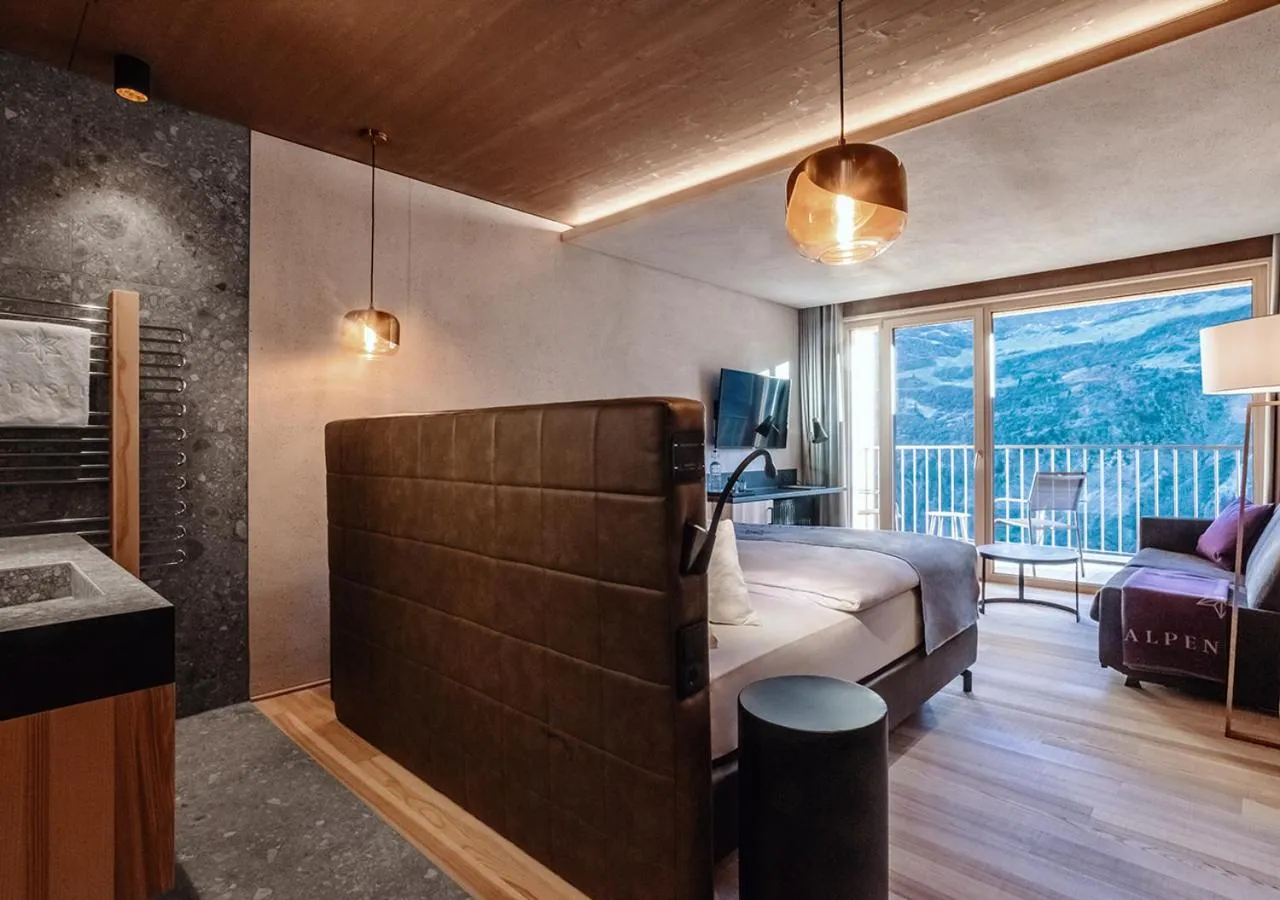 Living room, Bed in Alpenstern Genießerhotel