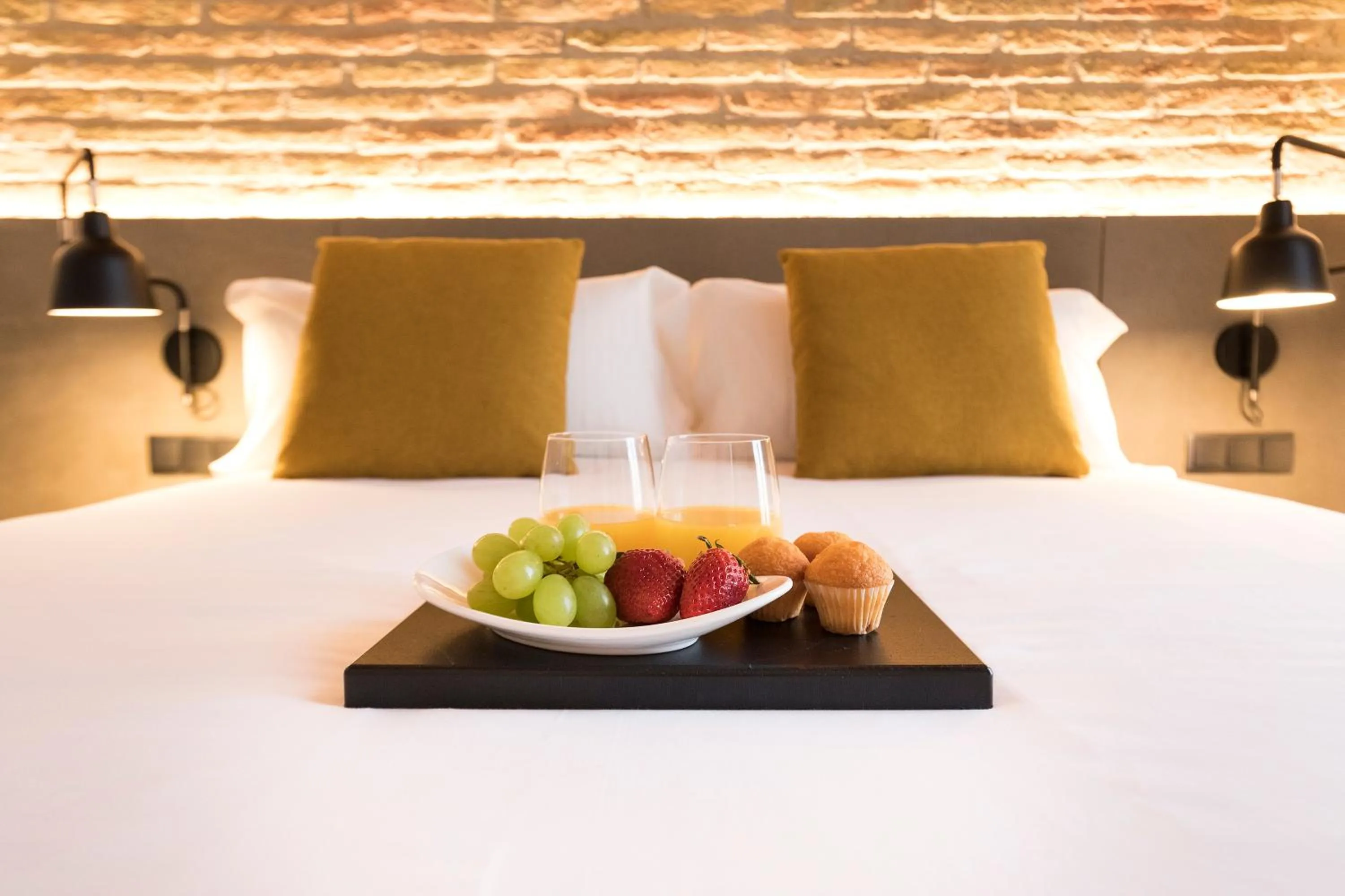 Bed in Aspasios Sagrada Familia Apartments