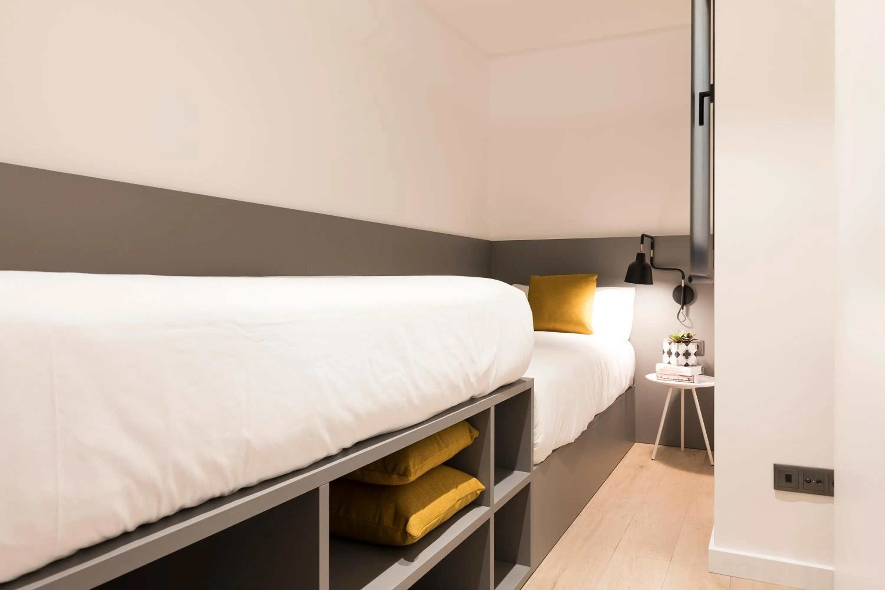 Bed in Aspasios Sagrada Familia Apartments