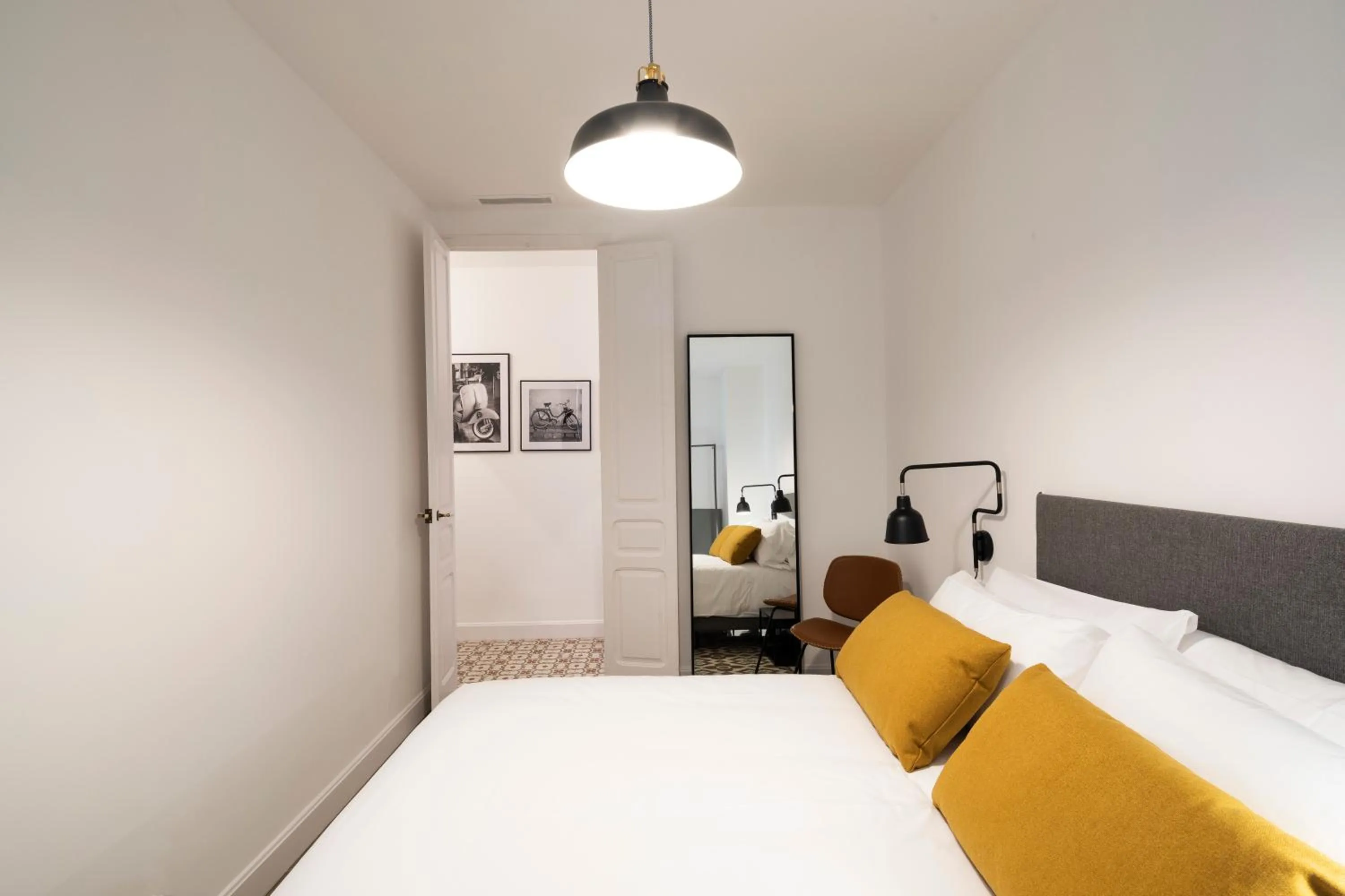 Bed in Aspasios Sagrada Familia Apartments