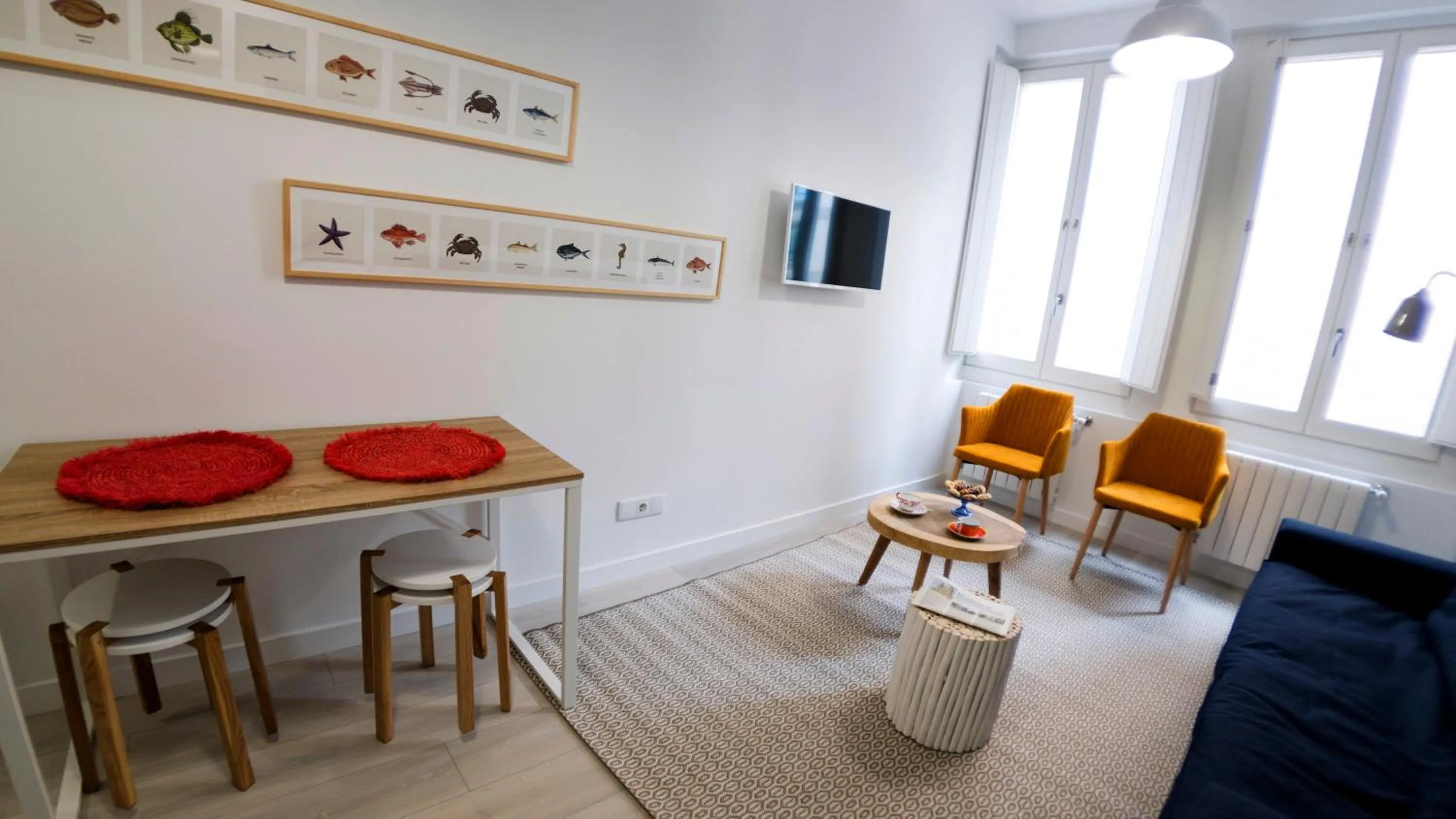 Living room, Dining Area in El Faro de Pepa by Como en Casa