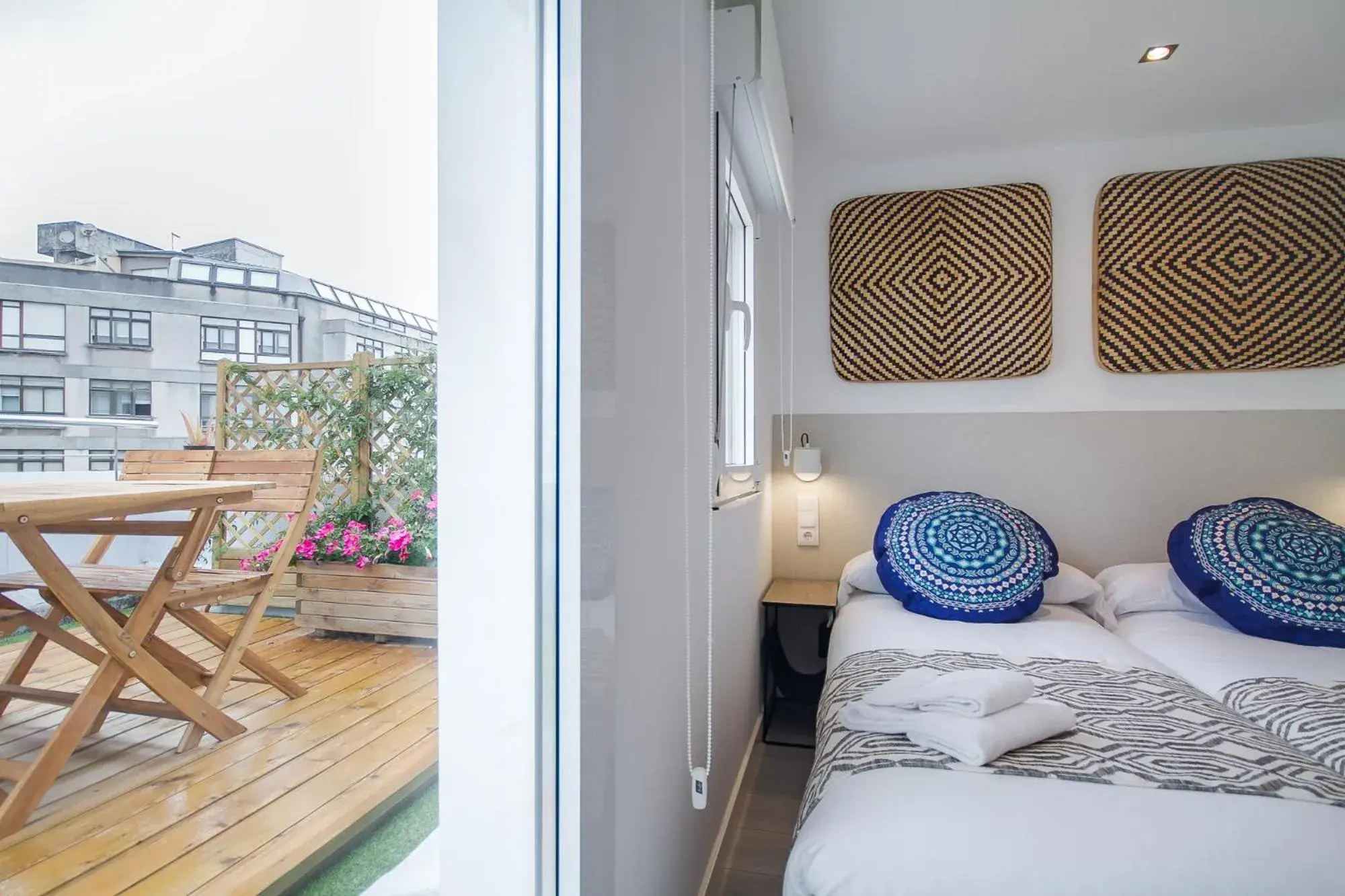 Balcony/Terrace, Bed in Santiago Center Rooms Balcony/Terrace, Bed in Santiago Center Rooms