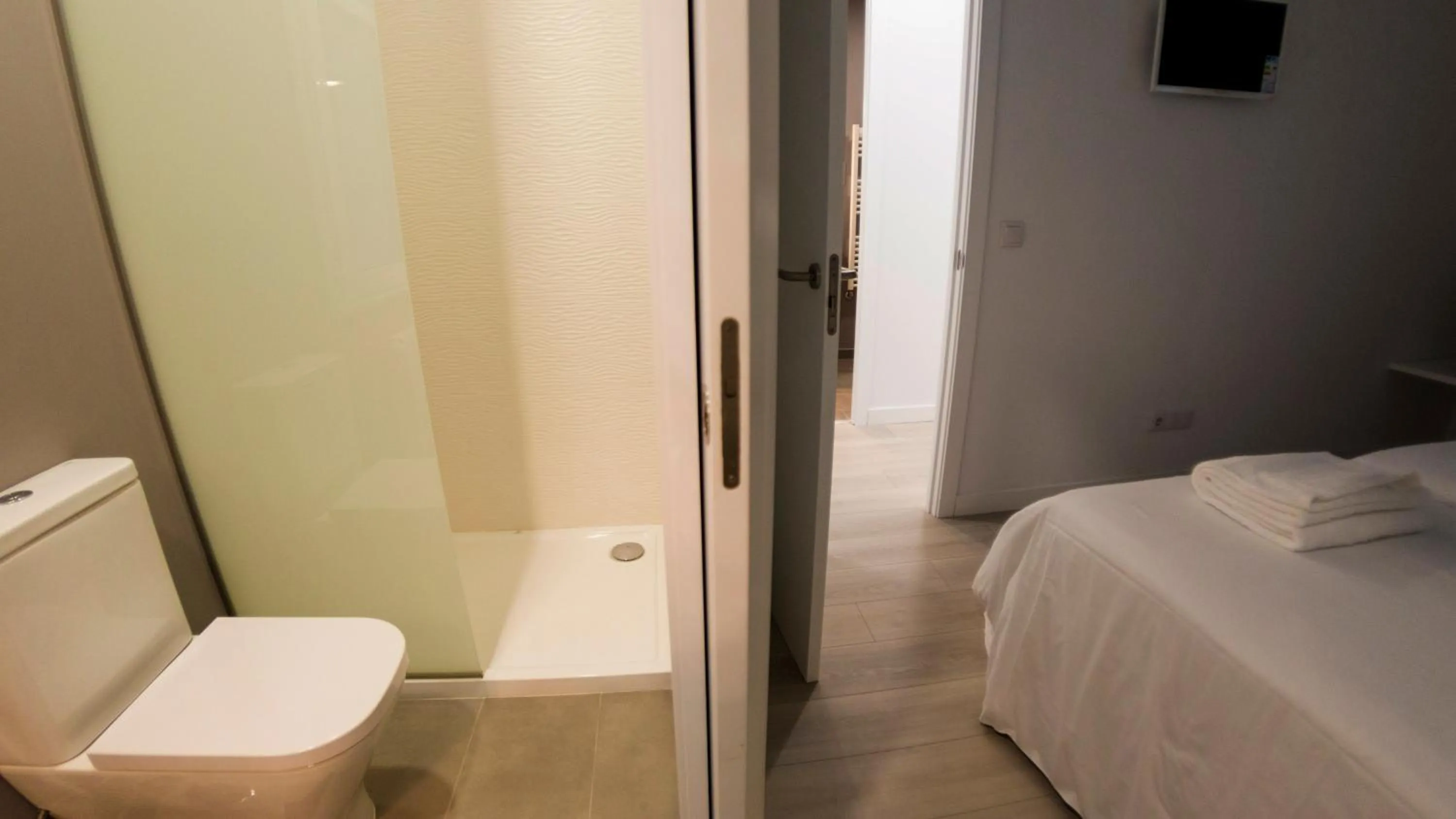 Bathroom, Bed in El Faro de Pepa by Como en Casa