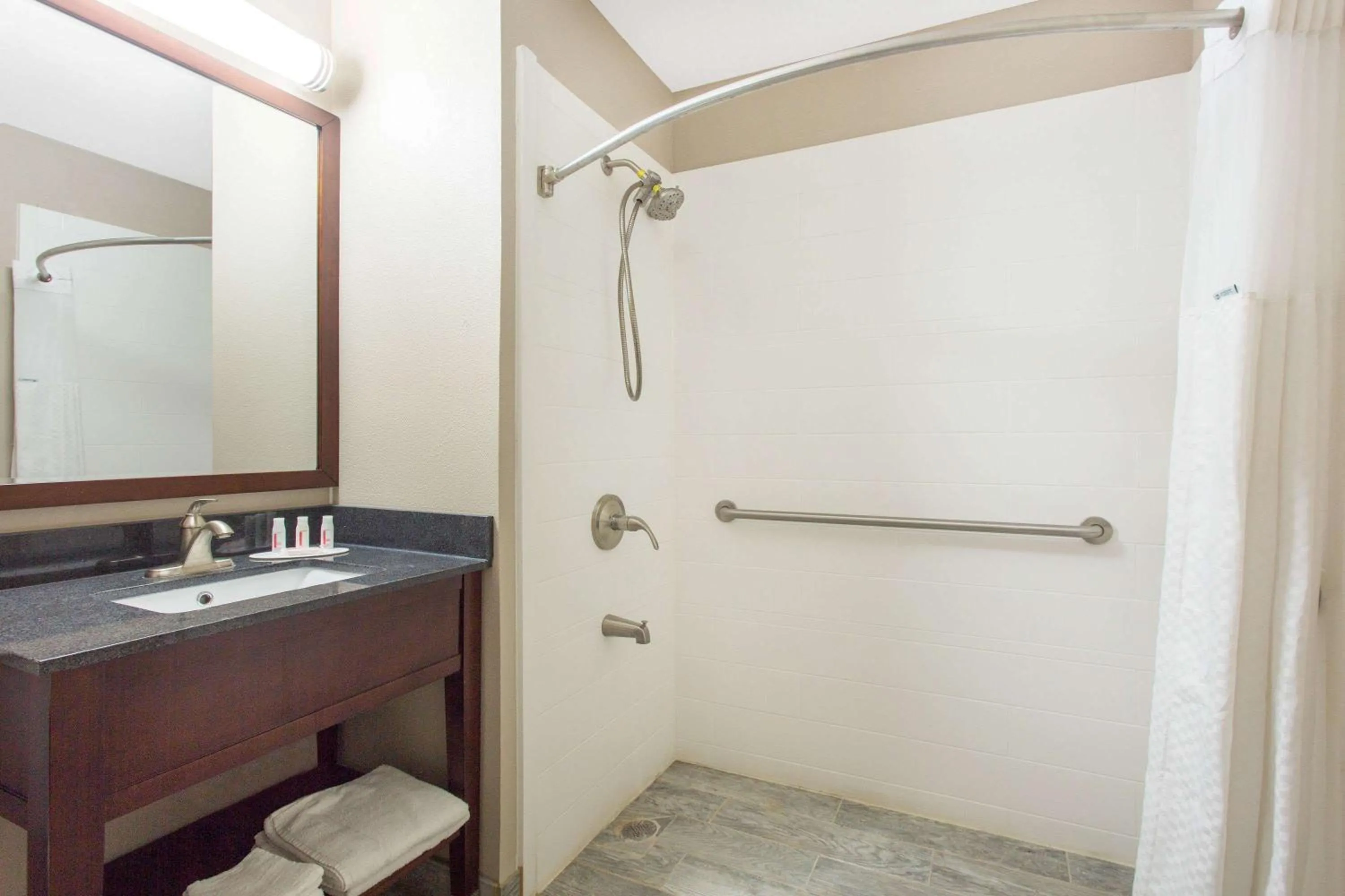 Shower in Super 8 by Wyndham Columbus Airport
