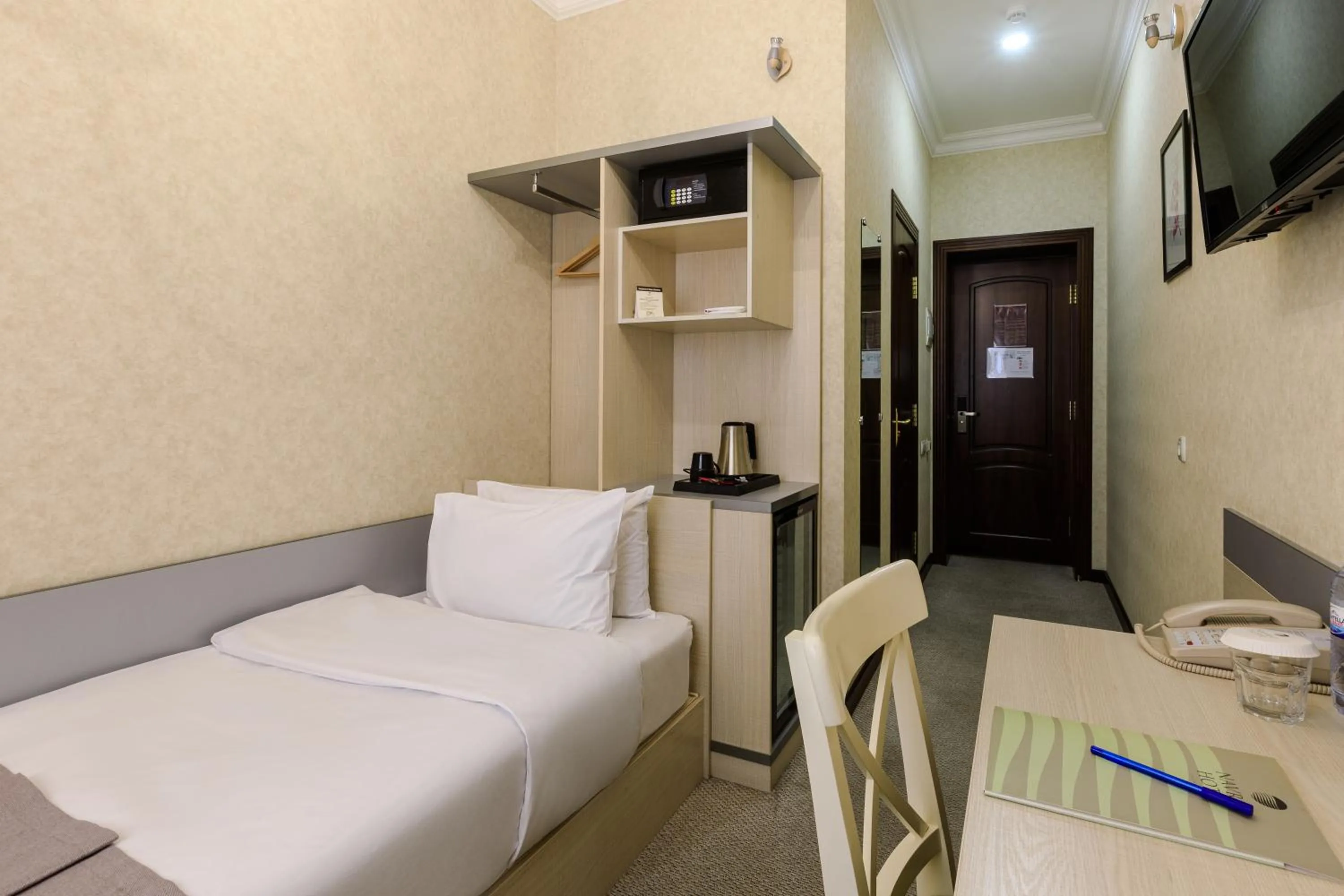 Photo of the whole room, Bed in Navruz Hotel Tashkent