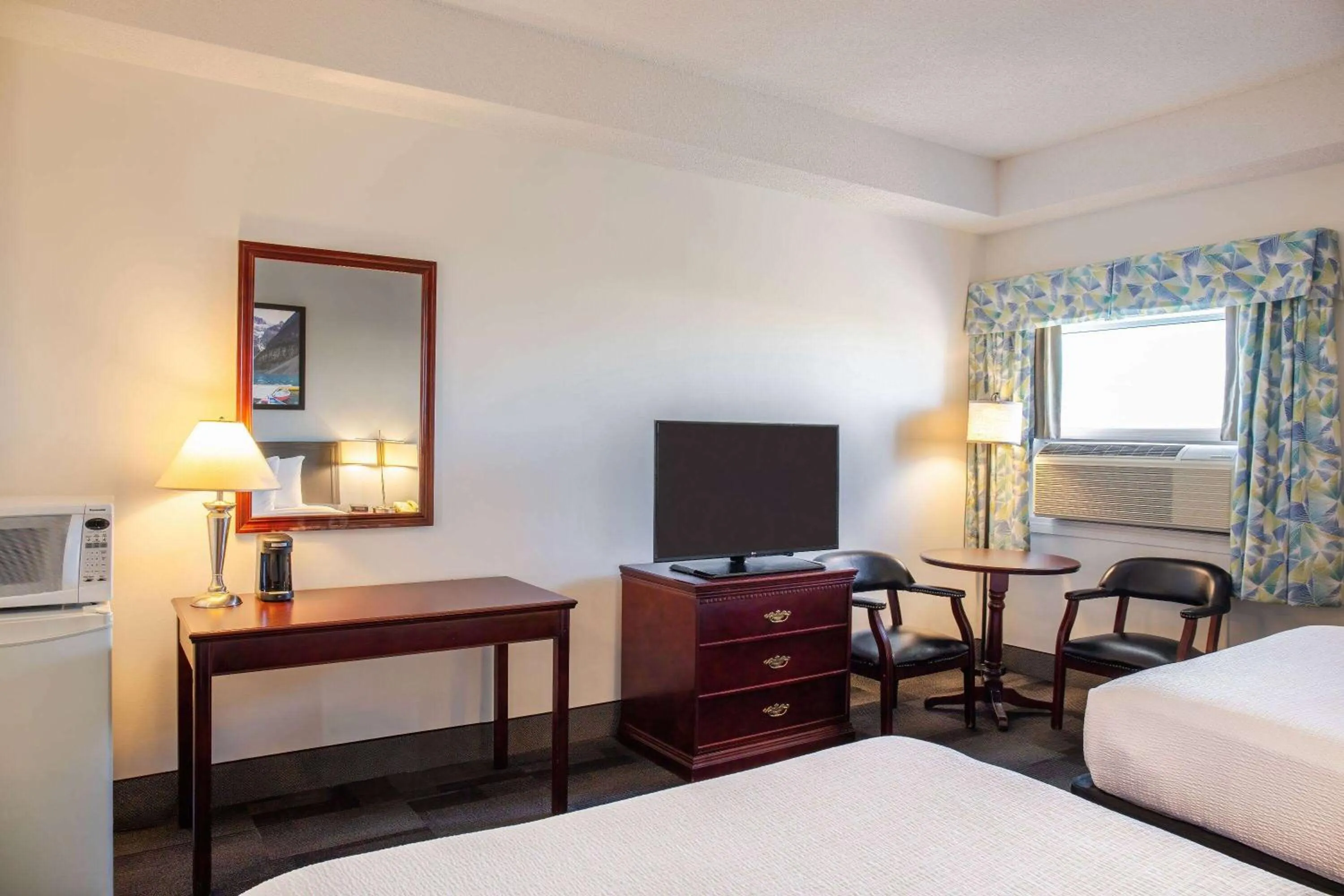 Bed in Days Inn & Conference Centre by Wyndham Camrose Norsemen