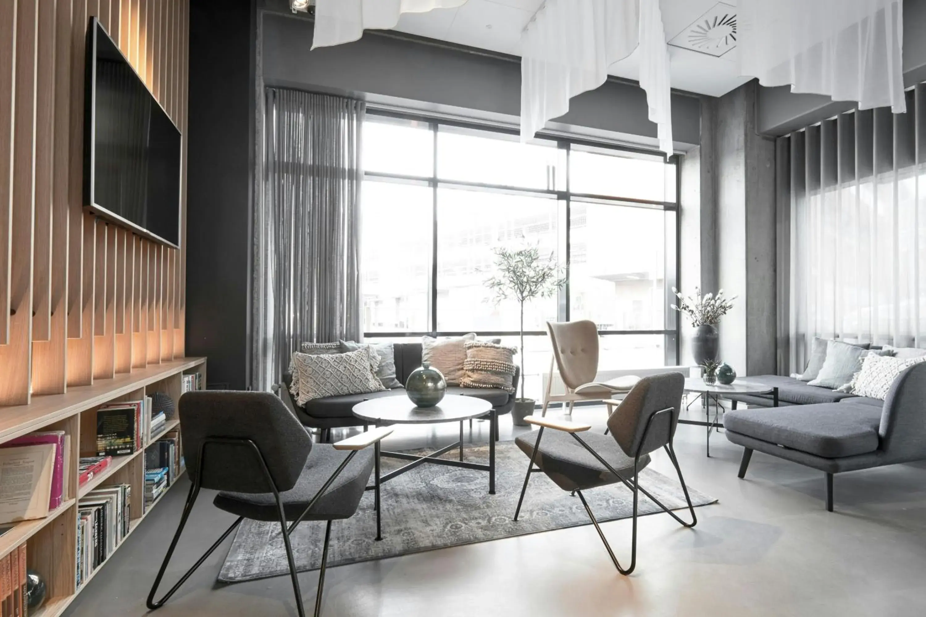 Lounge or bar in Four Points Flex by Sheraton Aalborg Lounge or bar in Four Points Flex by Sheraton Aalborg