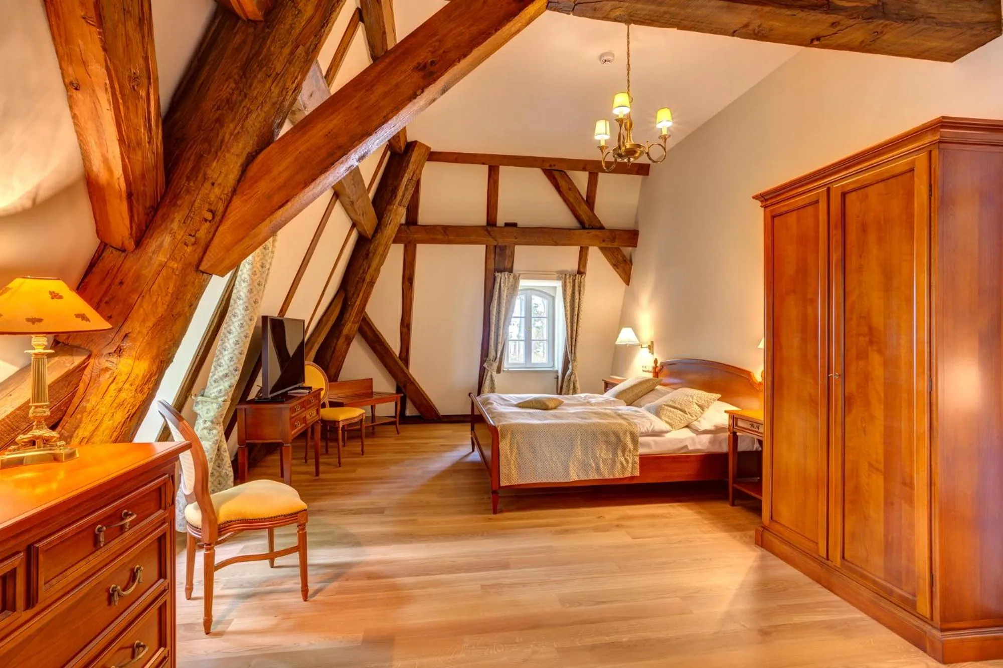 Bed in Urlaubsresidenz Marstall und Kanzlei im Schlossensemble