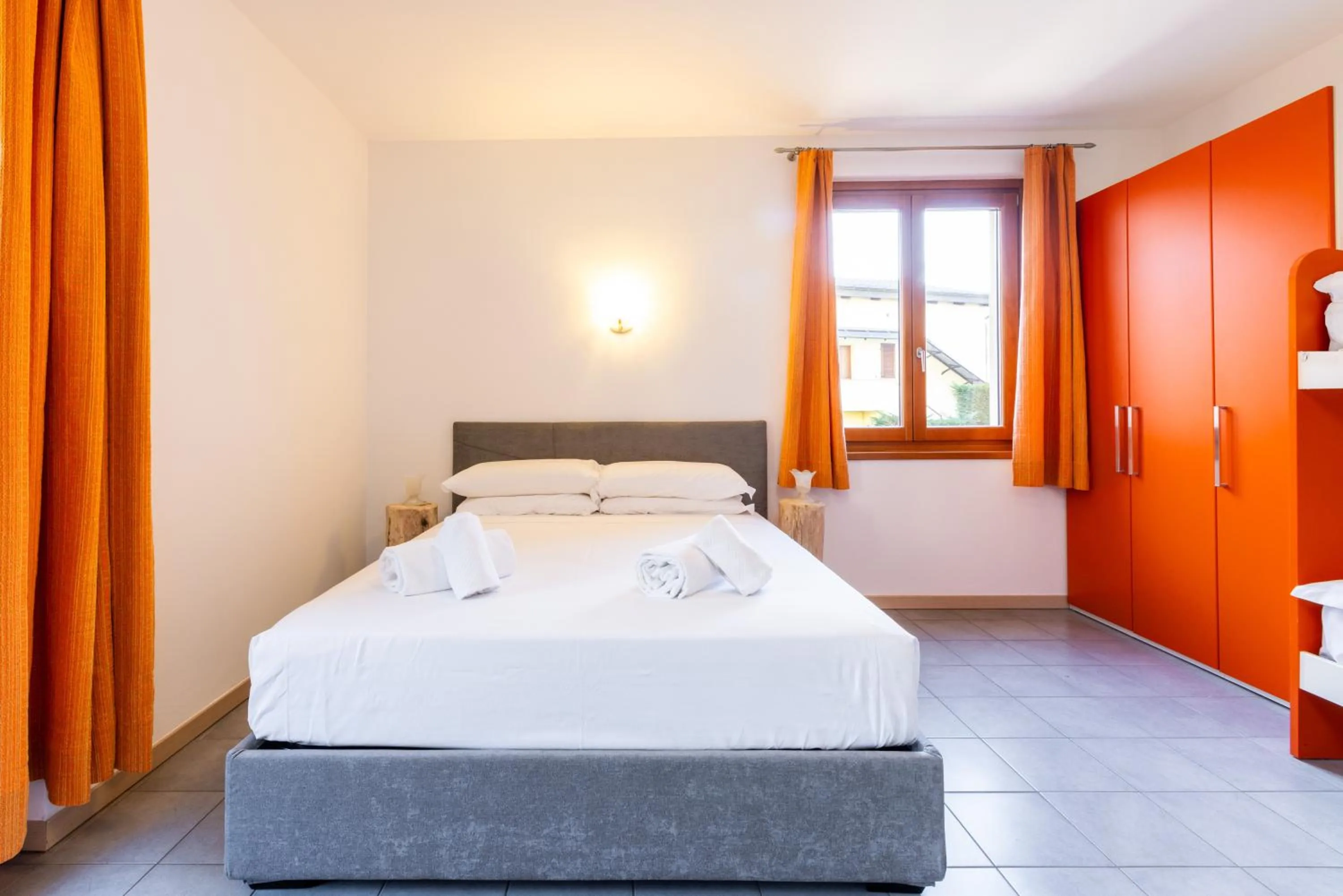 Bed in Spluga "Relax & Apartaments" by Alfio Colombo