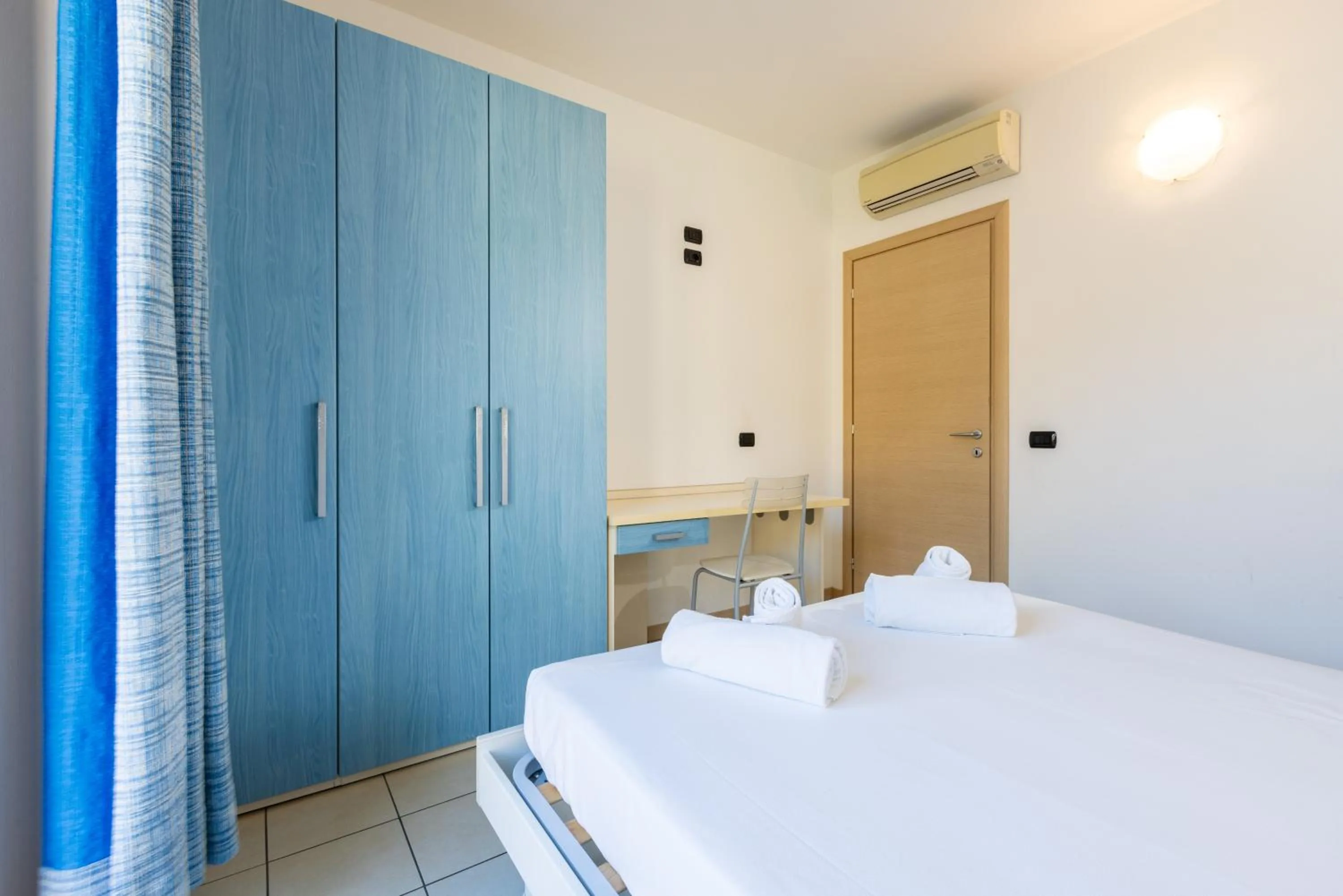 Bed in Spluga "Relax & Apartaments" by Alfio Colombo