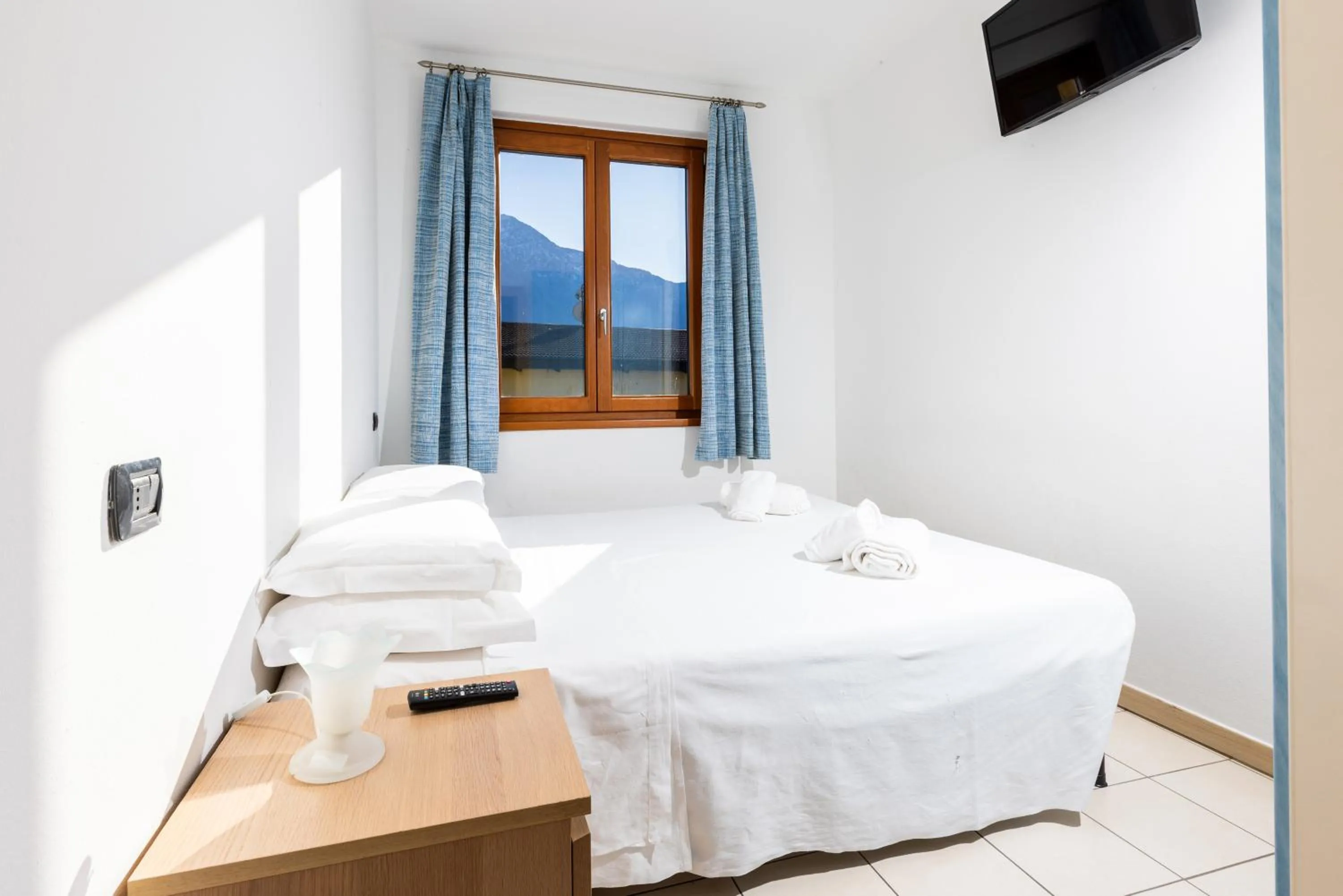 Bed in Spluga "Relax & Apartaments" by Alfio Colombo