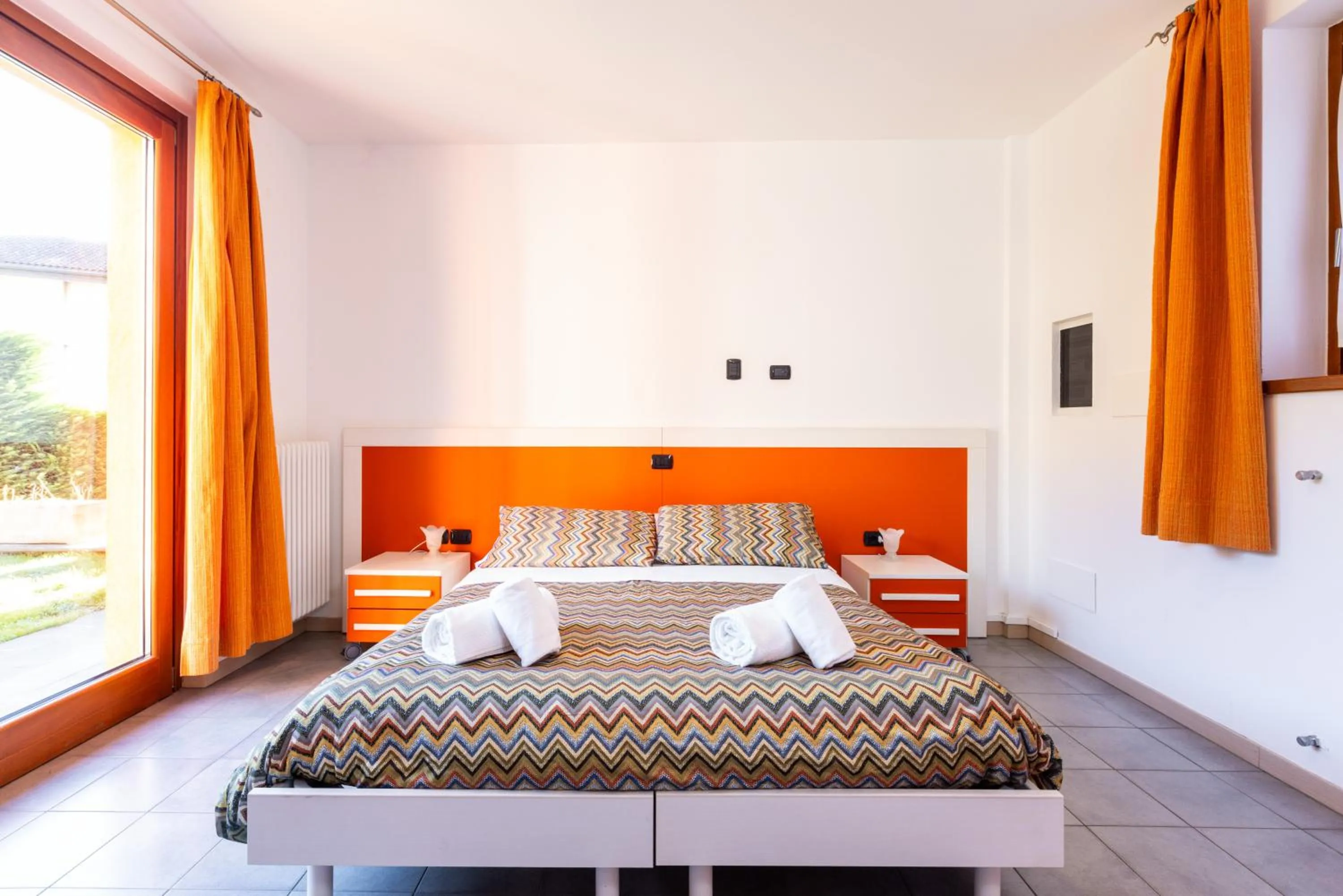 Bed in Spluga "Relax & Apartaments" by Alfio Colombo