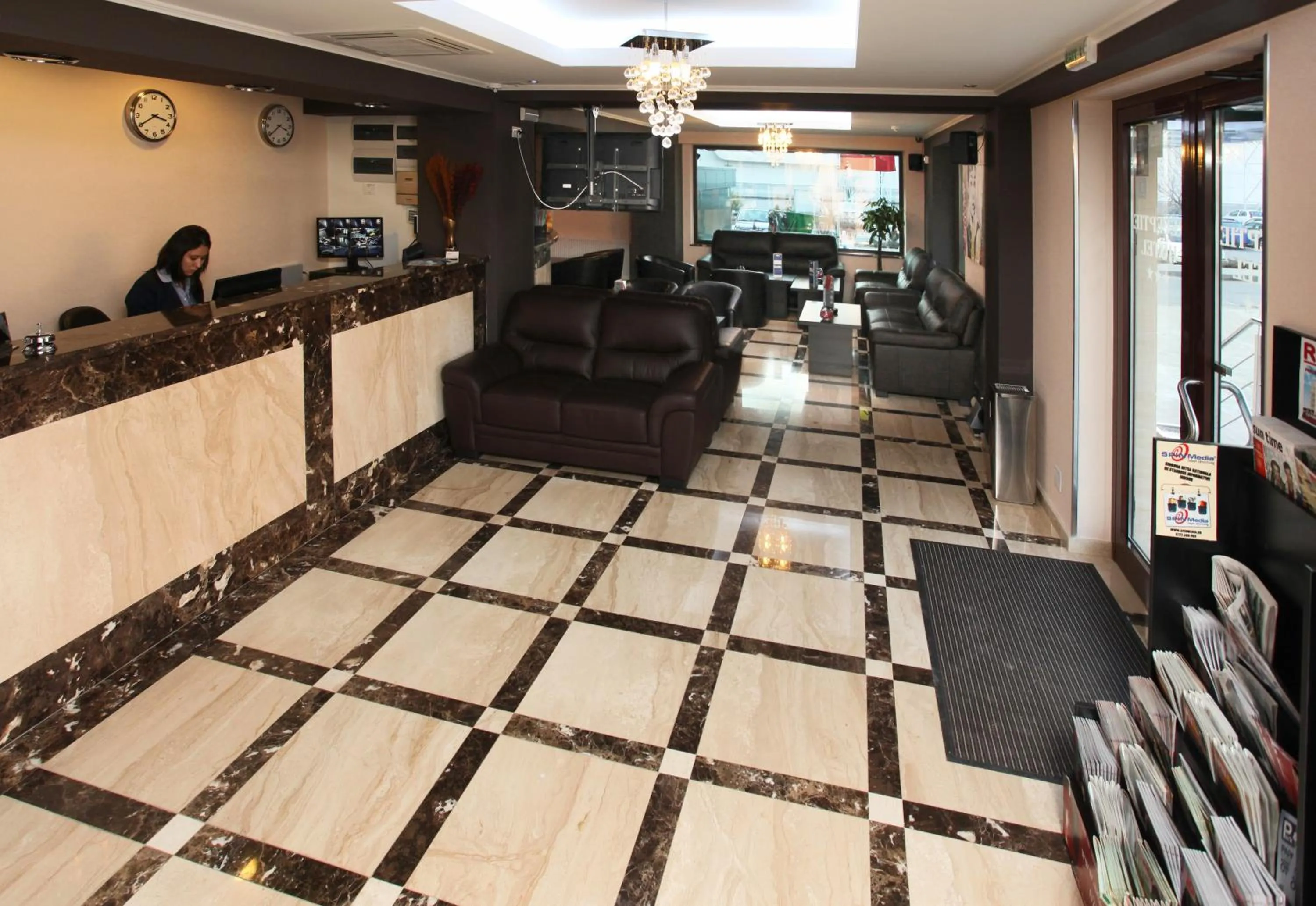 Lobby or reception in West Plaza Hotel