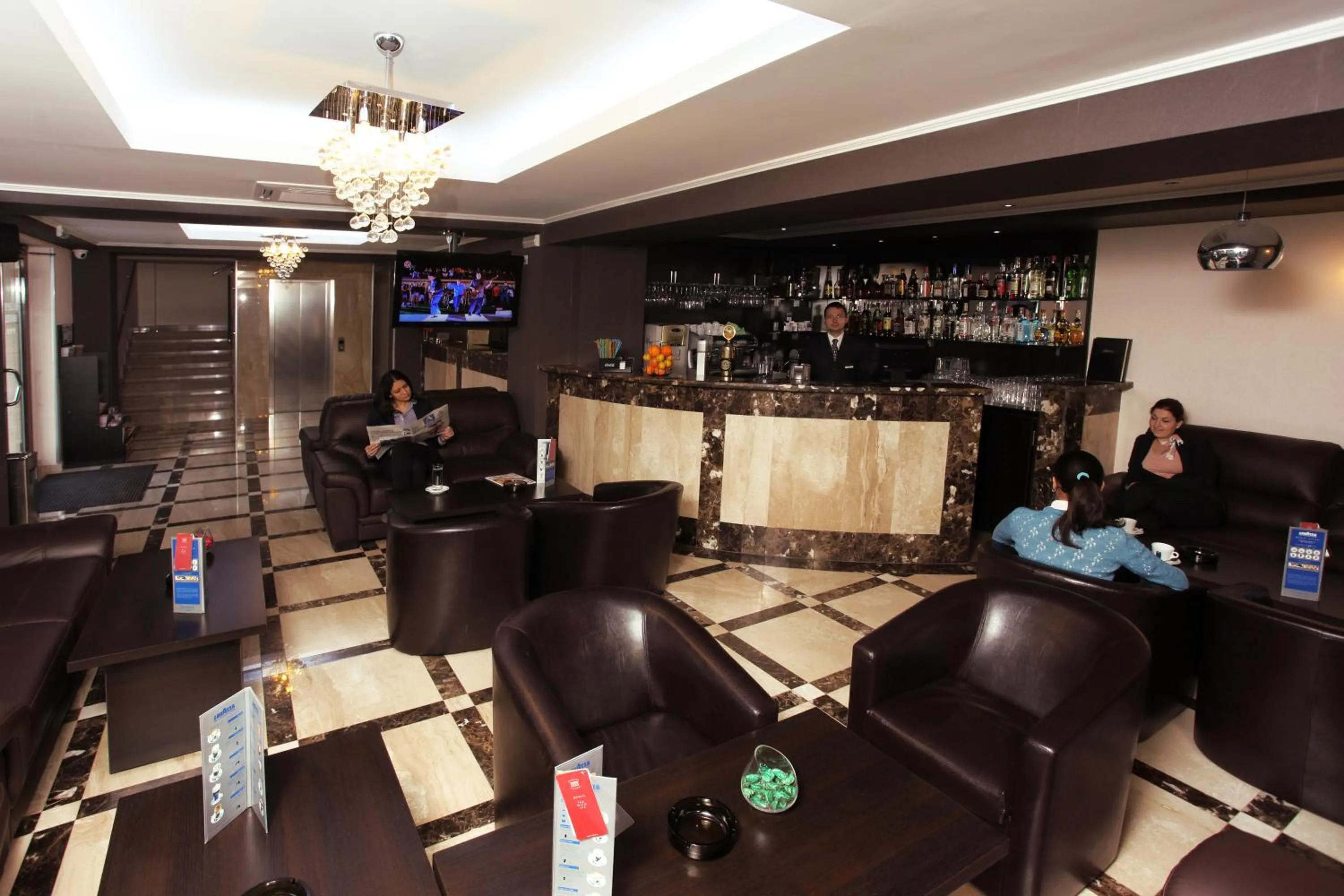 Lounge or bar in West Plaza Hotel