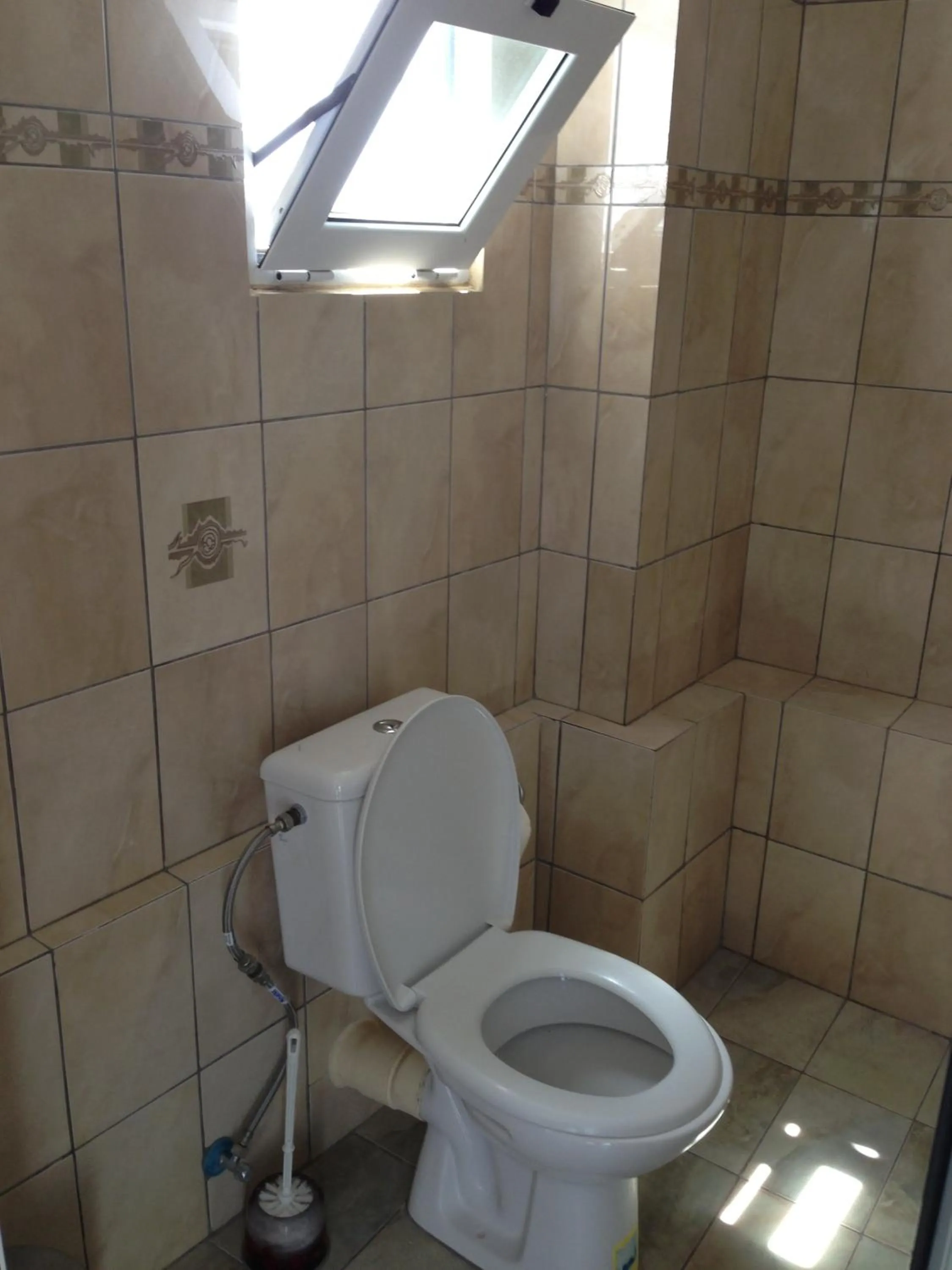 Bathroom in Nitsa Rooms