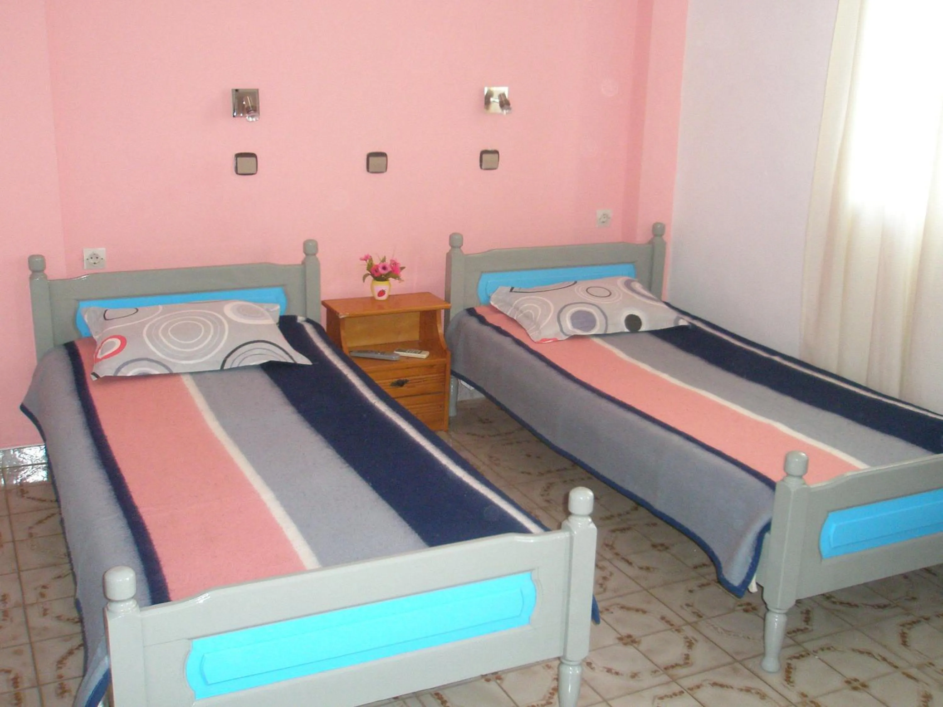 Bed in Nitsa Rooms