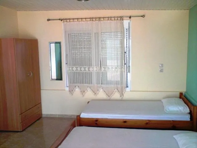 Bed in Nitsa Rooms