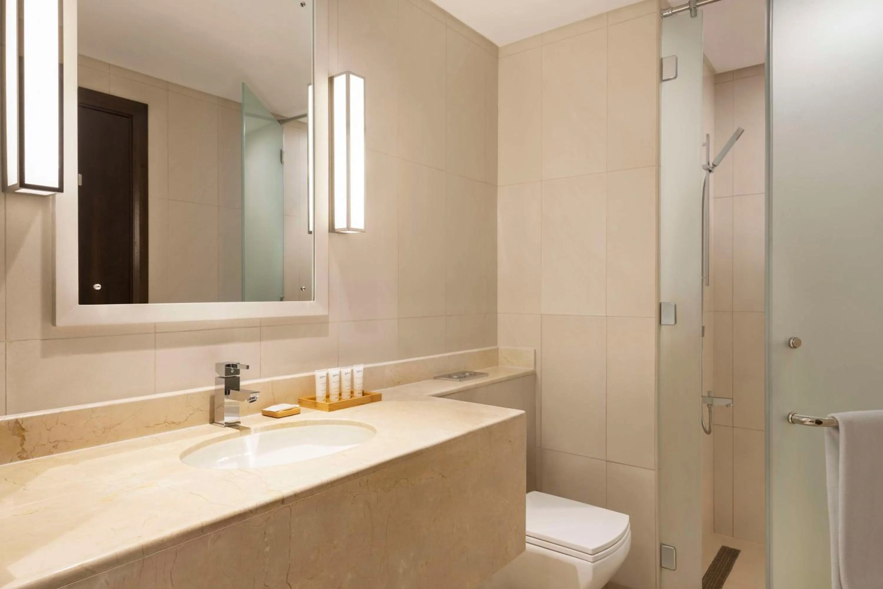 Bedroom in Radisson Hotel Muscat Panorama