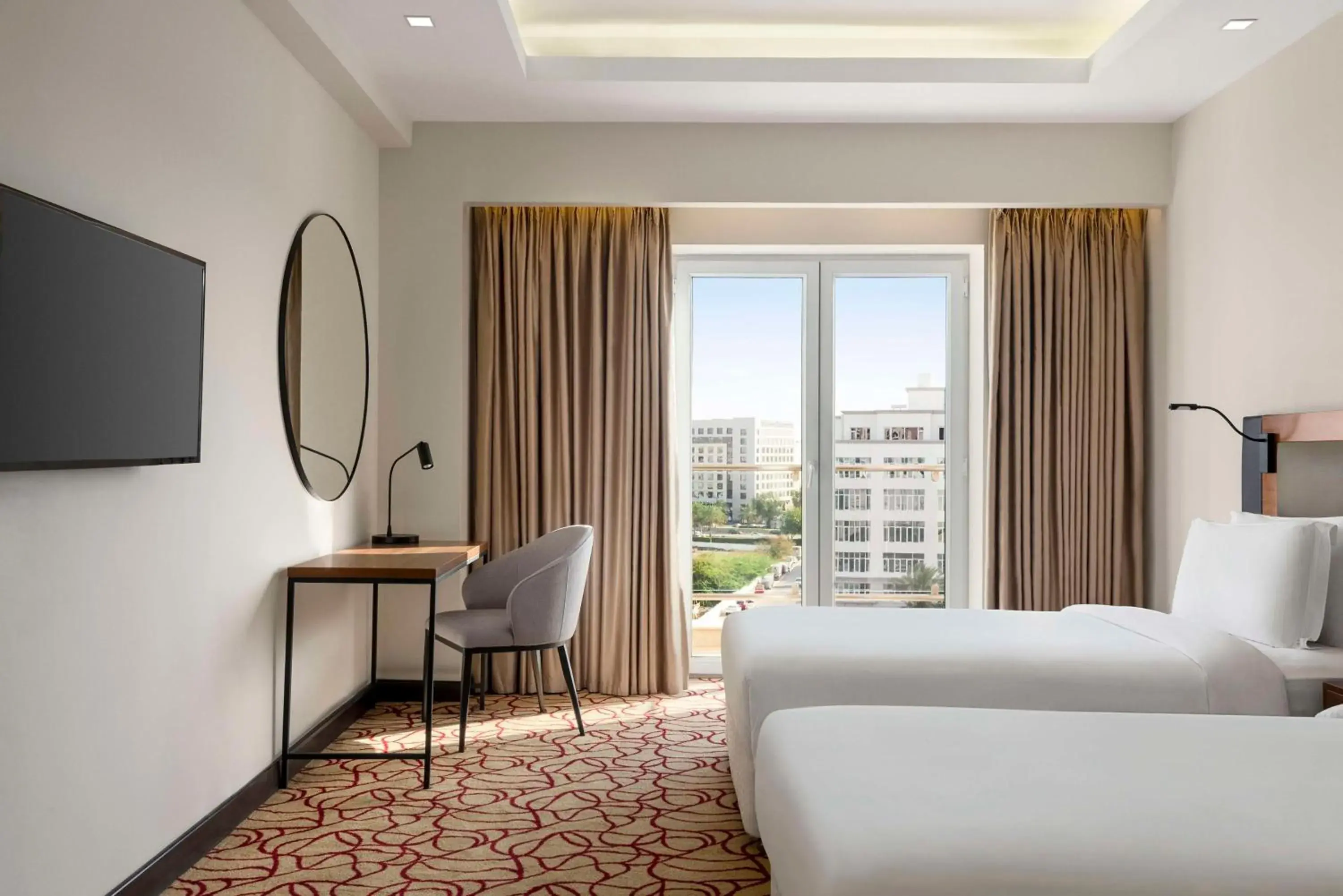 Photo of the whole room, Bed in Radisson Hotel Muscat Panorama Photo of the whole room, Bed in Radisson Hotel Muscat Panorama