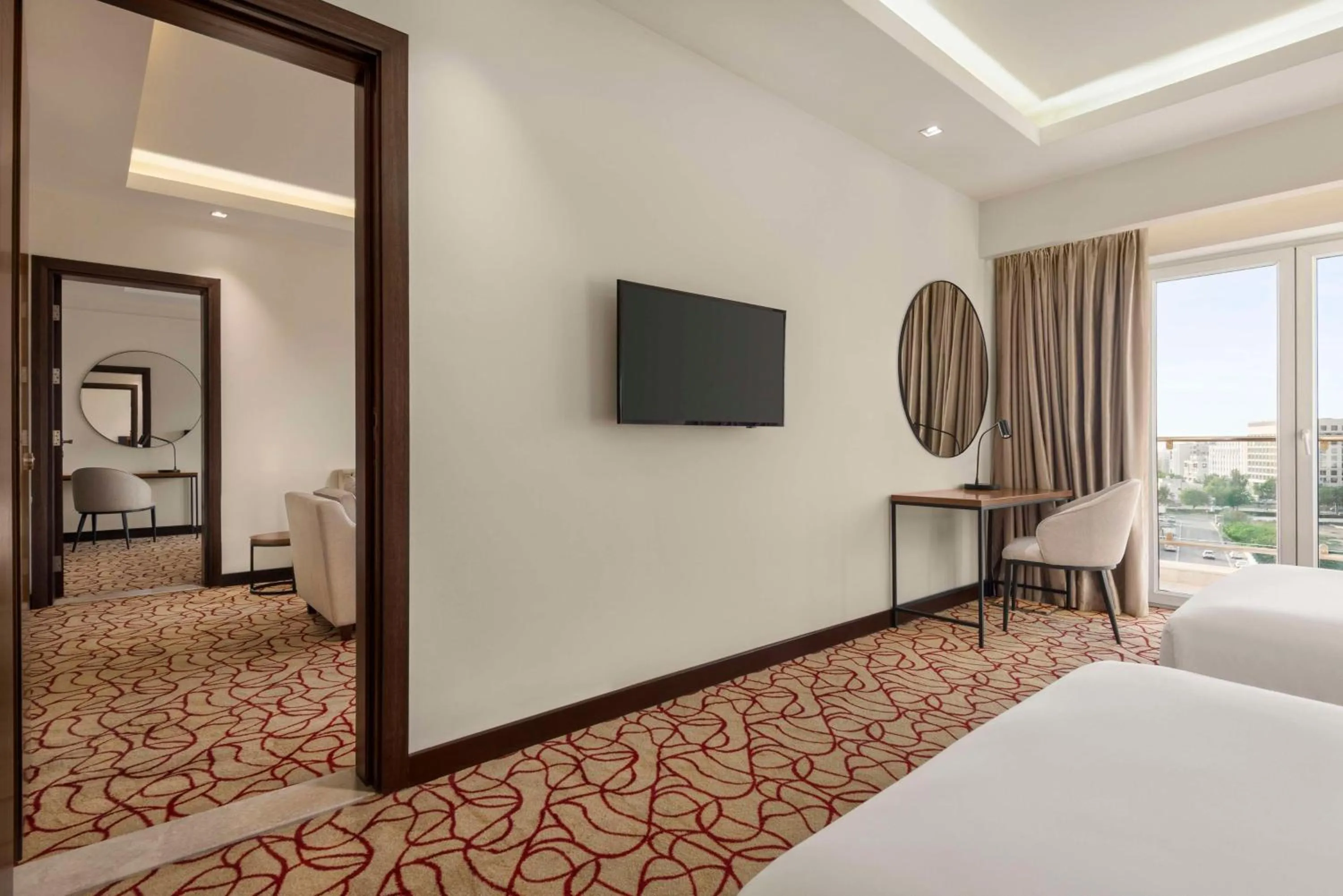 Photo of the whole room, Bed in Radisson Hotel Muscat Panorama
