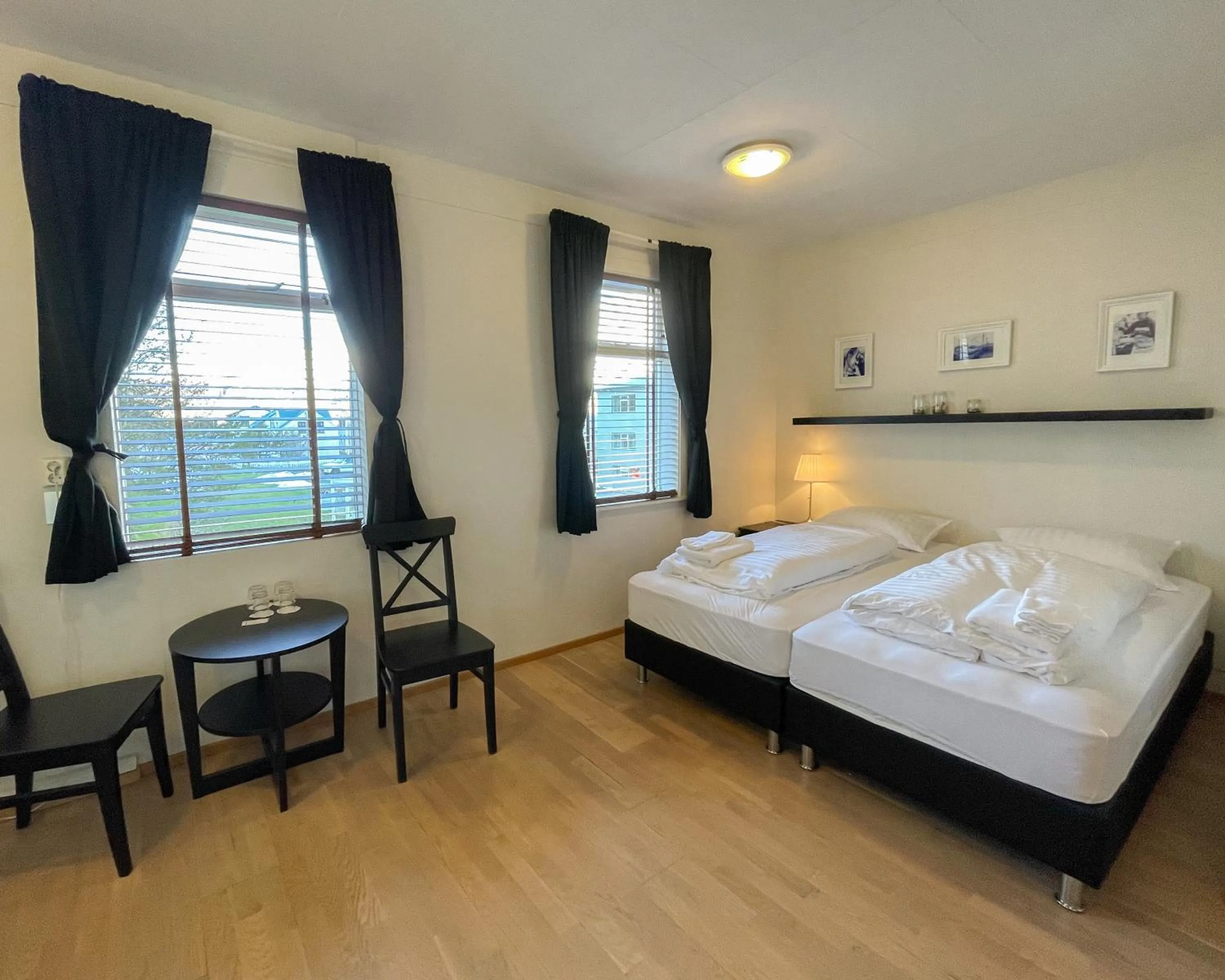 Bed in Fisherman Guesthouse Sudureyri