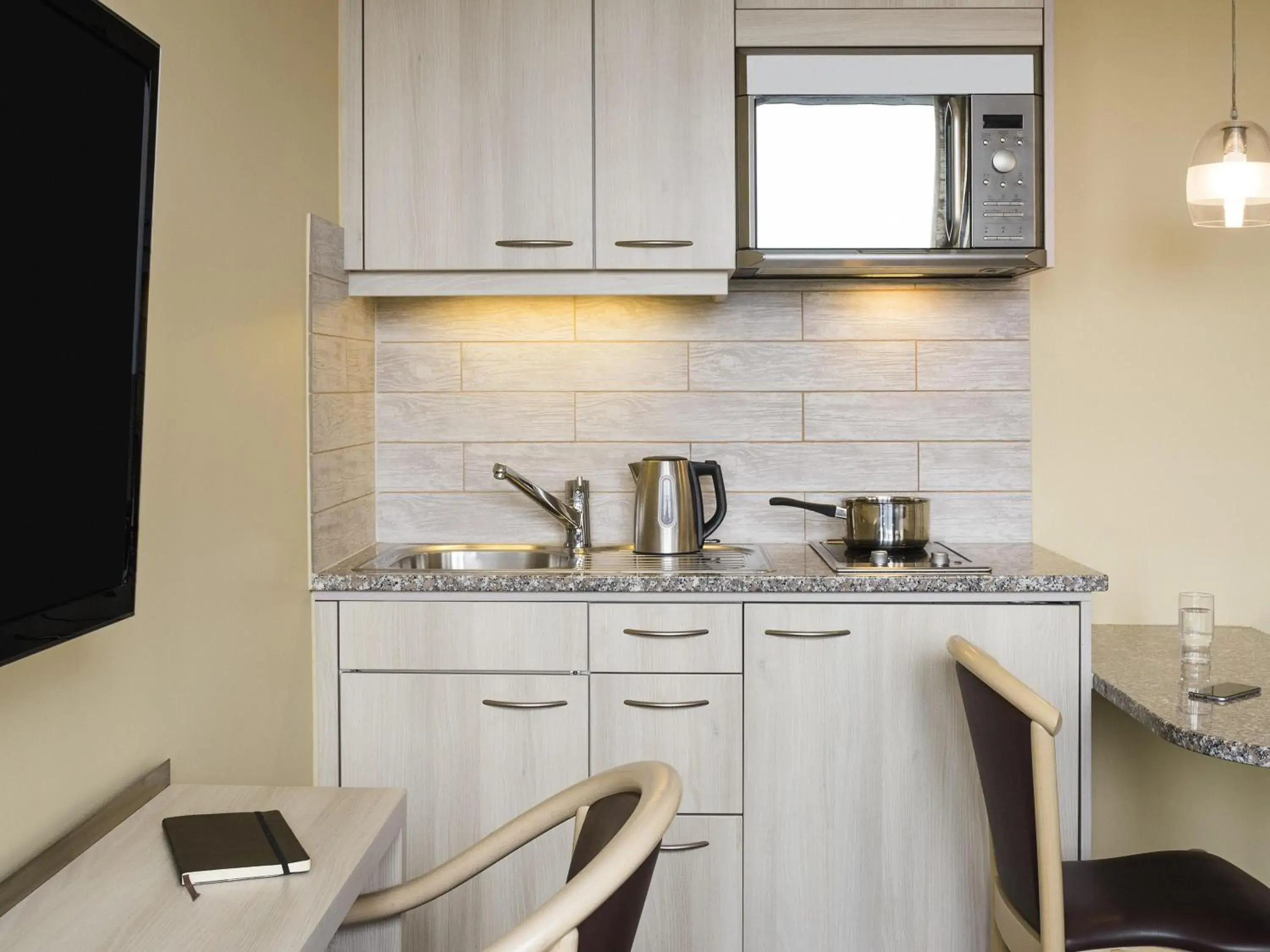 Bedroom in Aparthotel Adagio Genève Mont-Blanc Bedroom in Aparthotel Adagio Genève Mont-Blanc