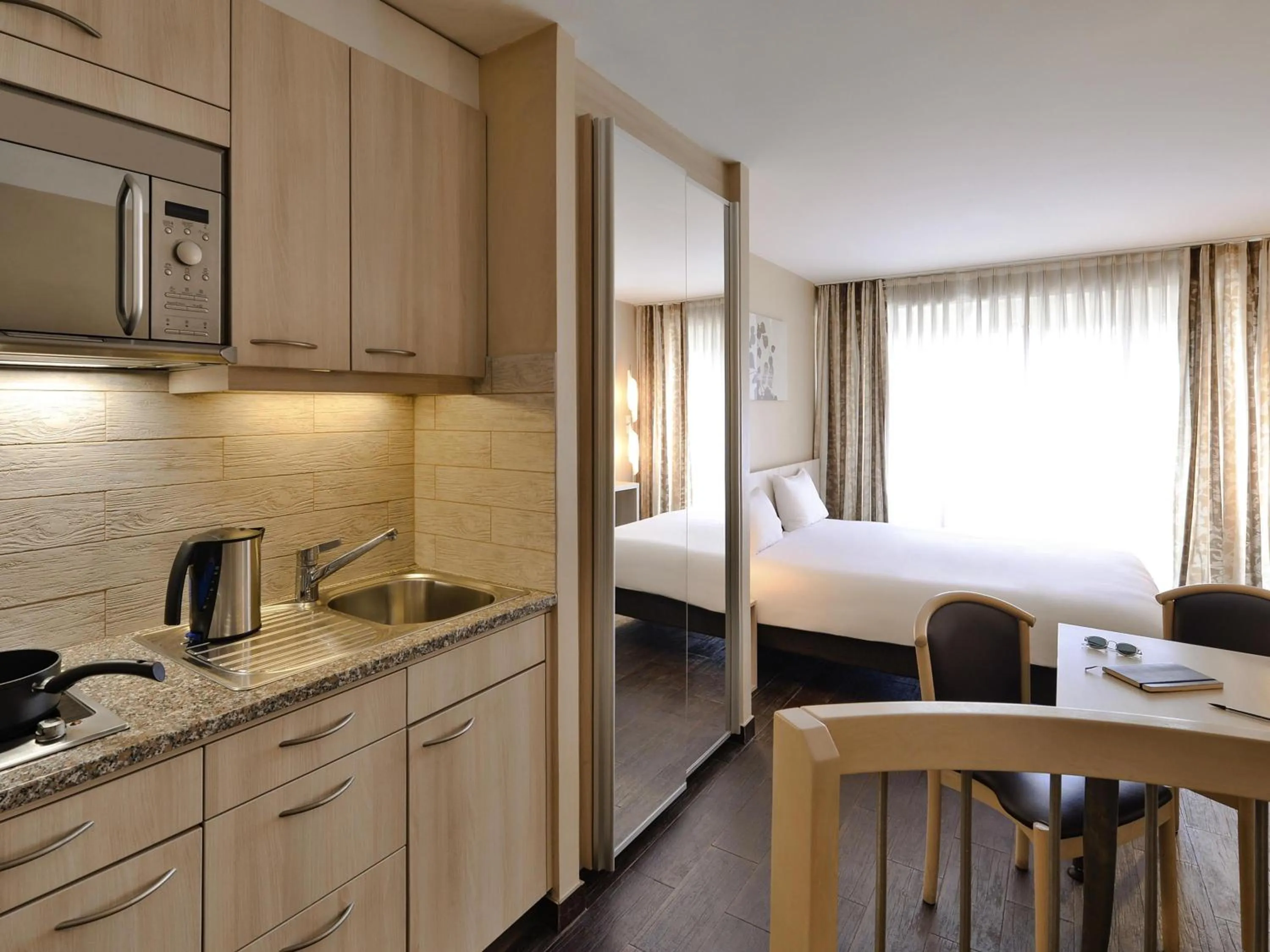 Bedroom, Bed in Aparthotel Adagio Genève Mont-Blanc