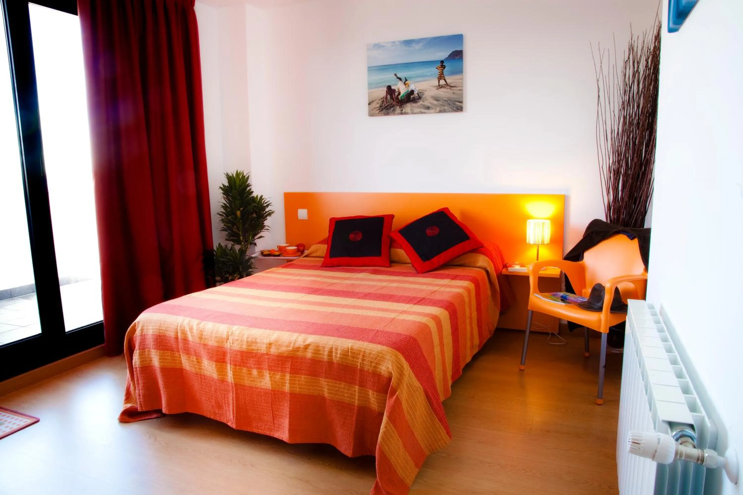 Photo of the whole room, Bed in Apartamentos Bahía de Boó