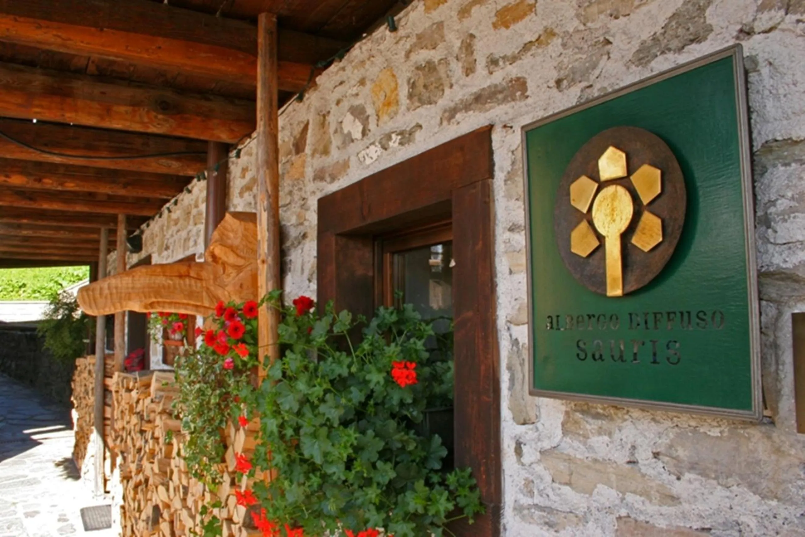 Property logo or sign in Albergo Diffuso Sauris in Sauris Di Sopra