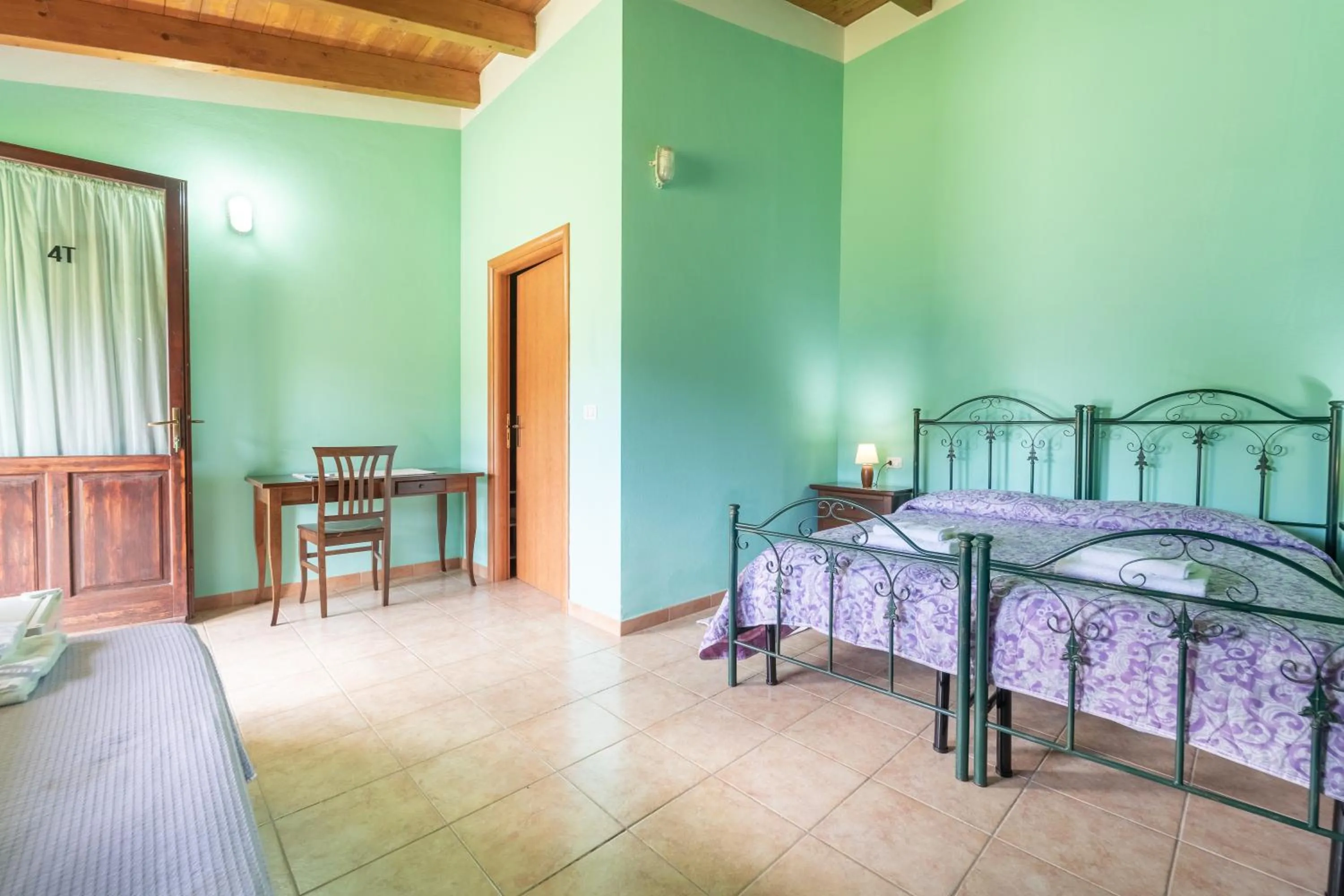 Bed in Agriturismo La Grotta Del Tesoro